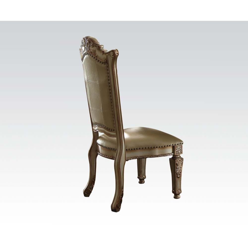 ACME KD, Armless Chair Backrest: Button Tufted (Inside), Wood & Nailhead Trim Padded Seat: PU with Nailhead Trim Wooden Seat Apron with Molding Trim Wooden Tapered Leg: Floral Motif | Meri Furniture