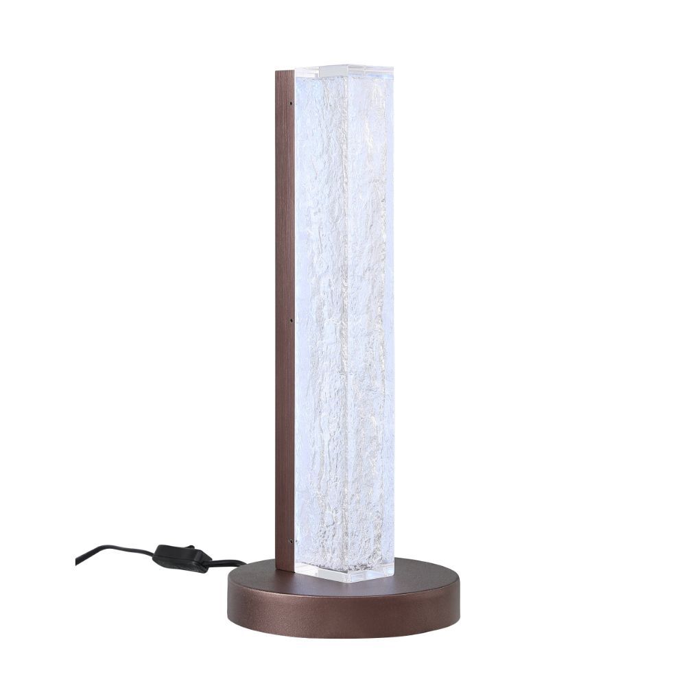 ACME Both a source of light and a beautiful accent piece, this clear resin lamp is not to be missed. The rectangular resin block of the lamp body leans modern, while the sleek finish of the metal base lends glamour to the overall design of this unique lam