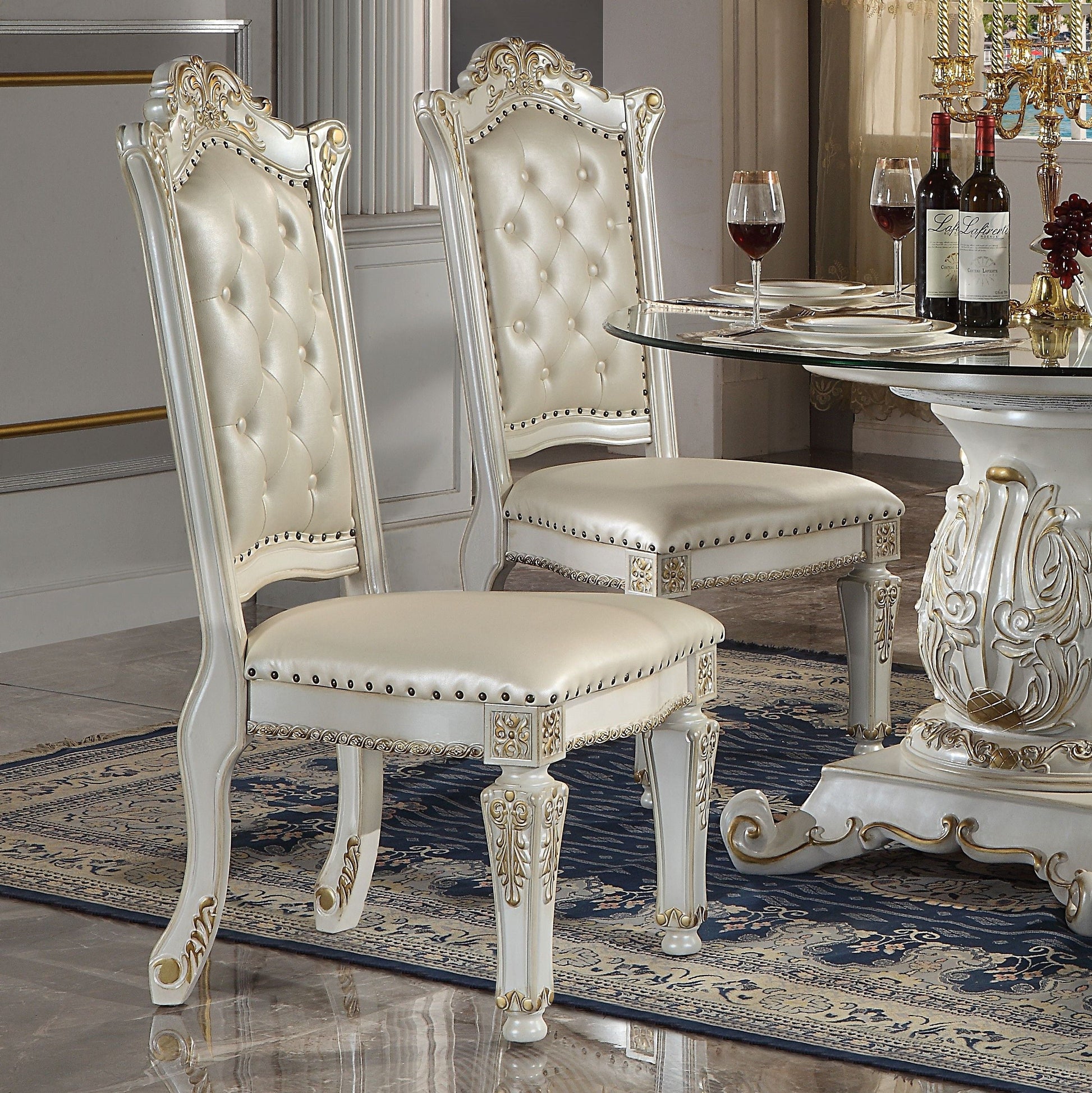 ACME KD, Armless Chair Backrest: Button Tufted (Inside), Wood & Nailhead Trim Padded Seat: PU with Nailhead Trim Wooden Seat Apron with Molding Trim Wooden Tapered Leg: Floral Motif | Meri Furniture