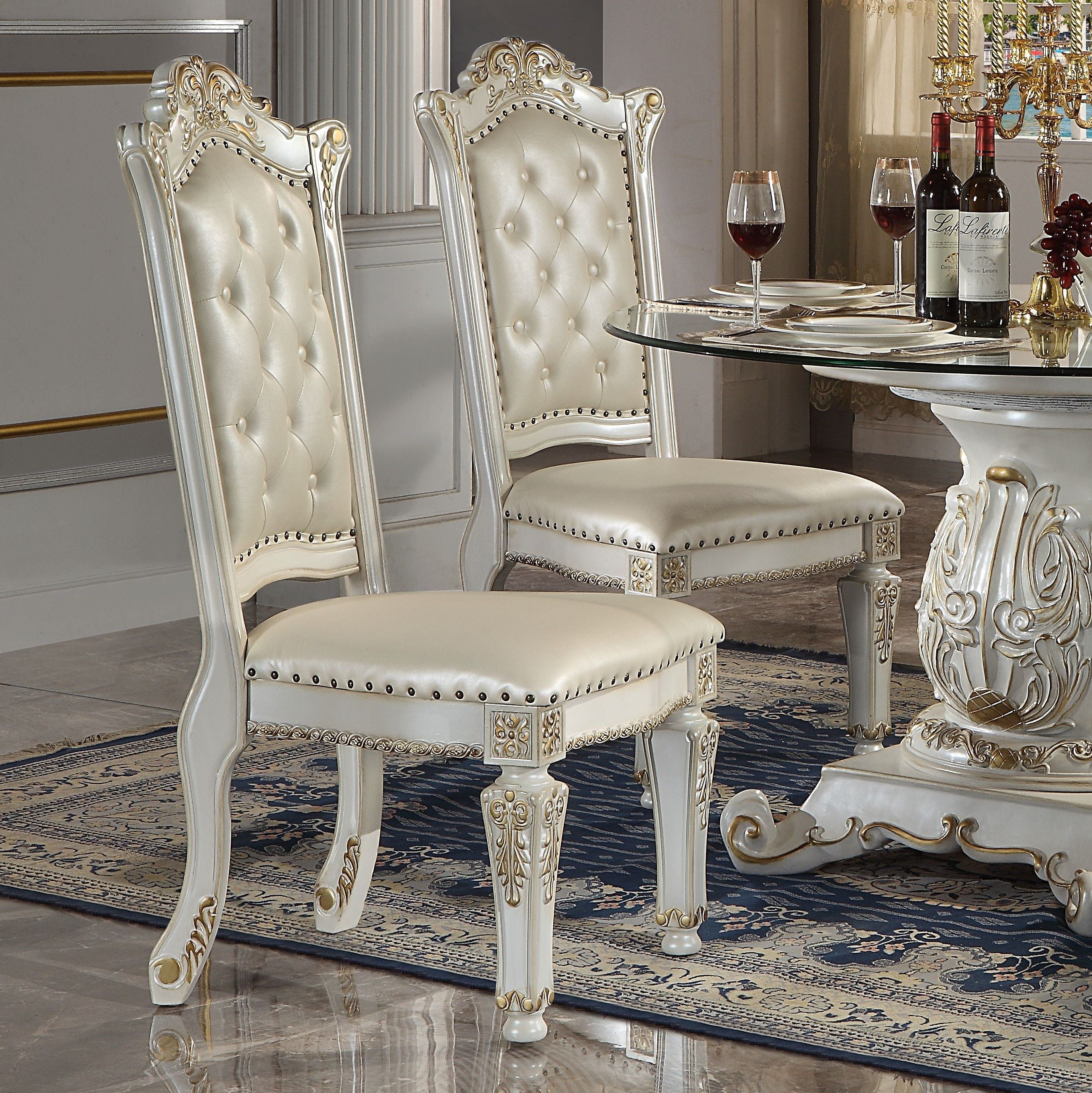 ACME KD, Armless Chair Backrest: Button Tufted (Inside), Wood & Nailhead Trim Padded Seat: PU with Nailhead Trim Wooden Seat Apron with Molding Trim Wooden Tapered Leg: Floral Motif | Meri Furniture