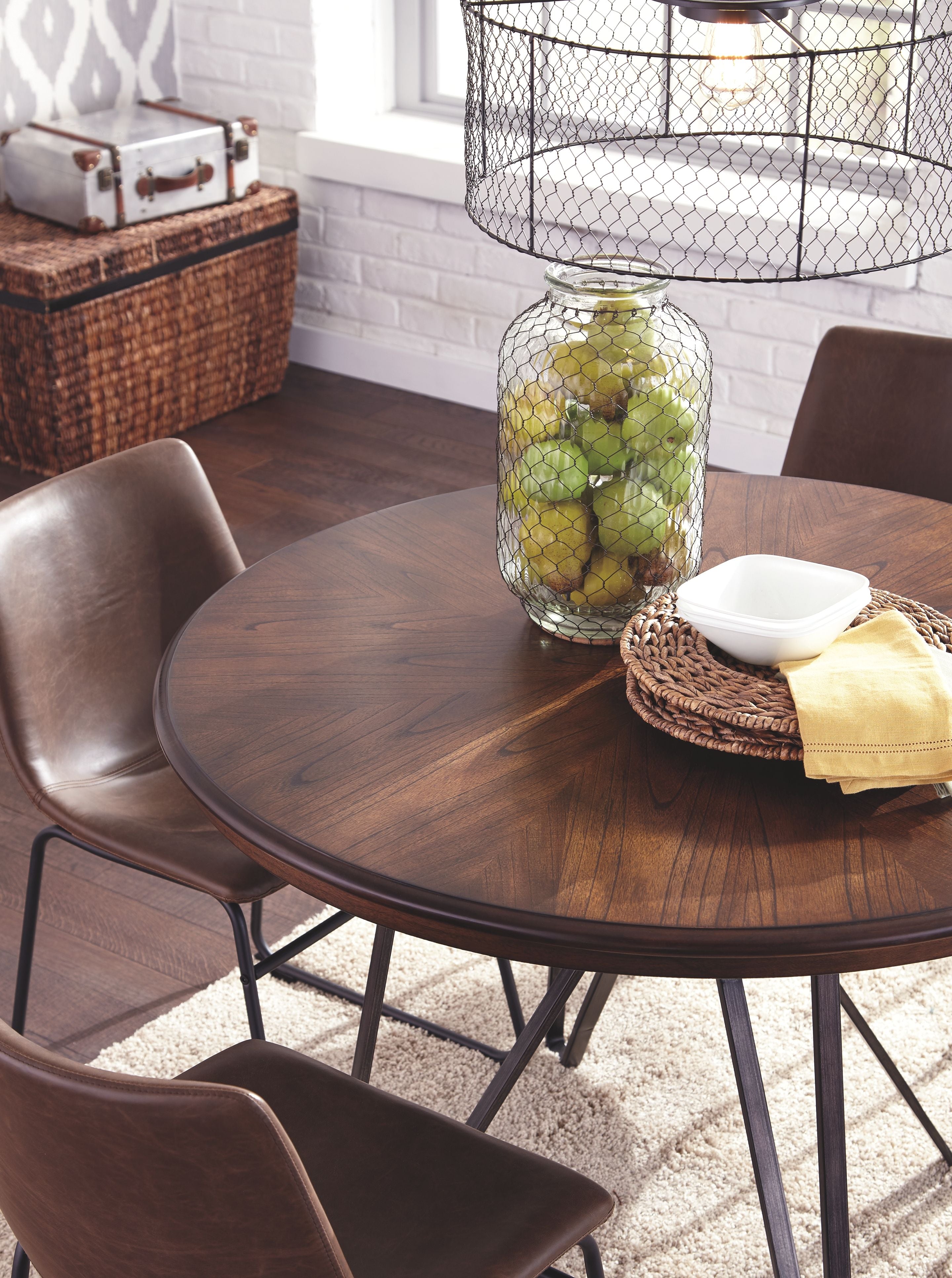Signature Design by Ashley® Centiar - Two-tone Brown - Round Dining Room Table | Meri Furniture