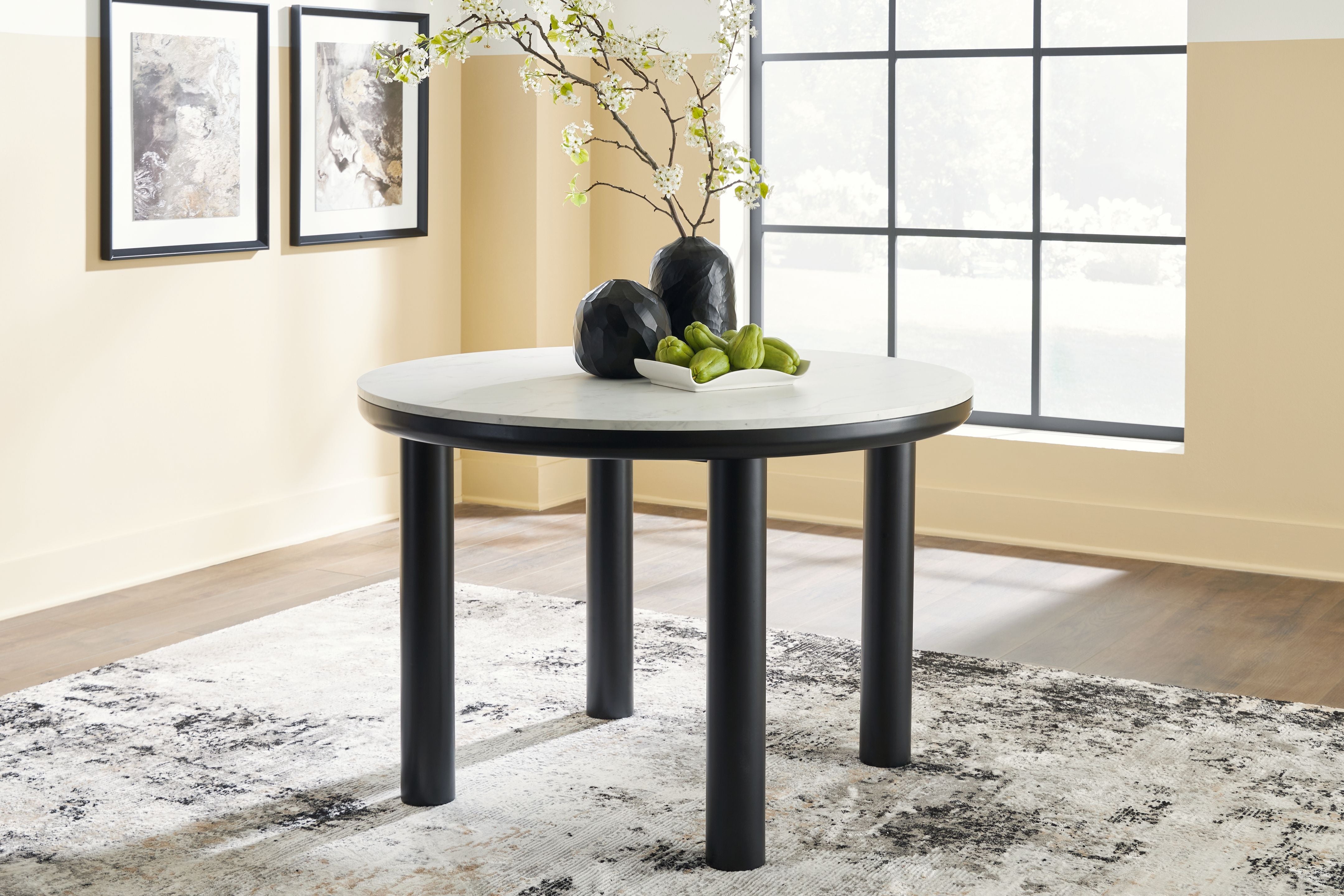 Signature Design by Ashley® Xandrum - Black - Round Dining Room Table | Meri Furniture