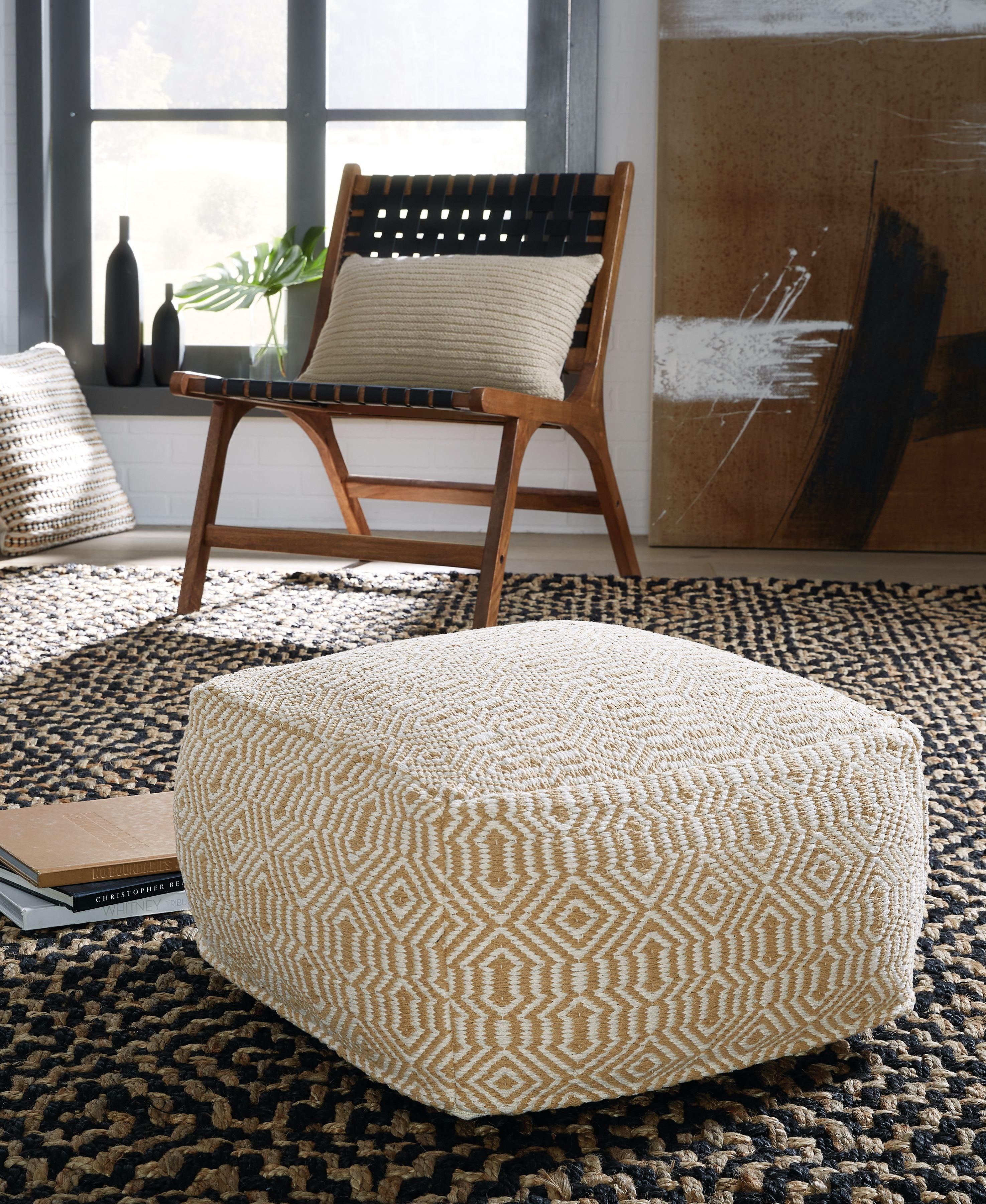 Signature Design by Ashley® Adamont - Tan / Ivory - Pouf | Meri Furniture