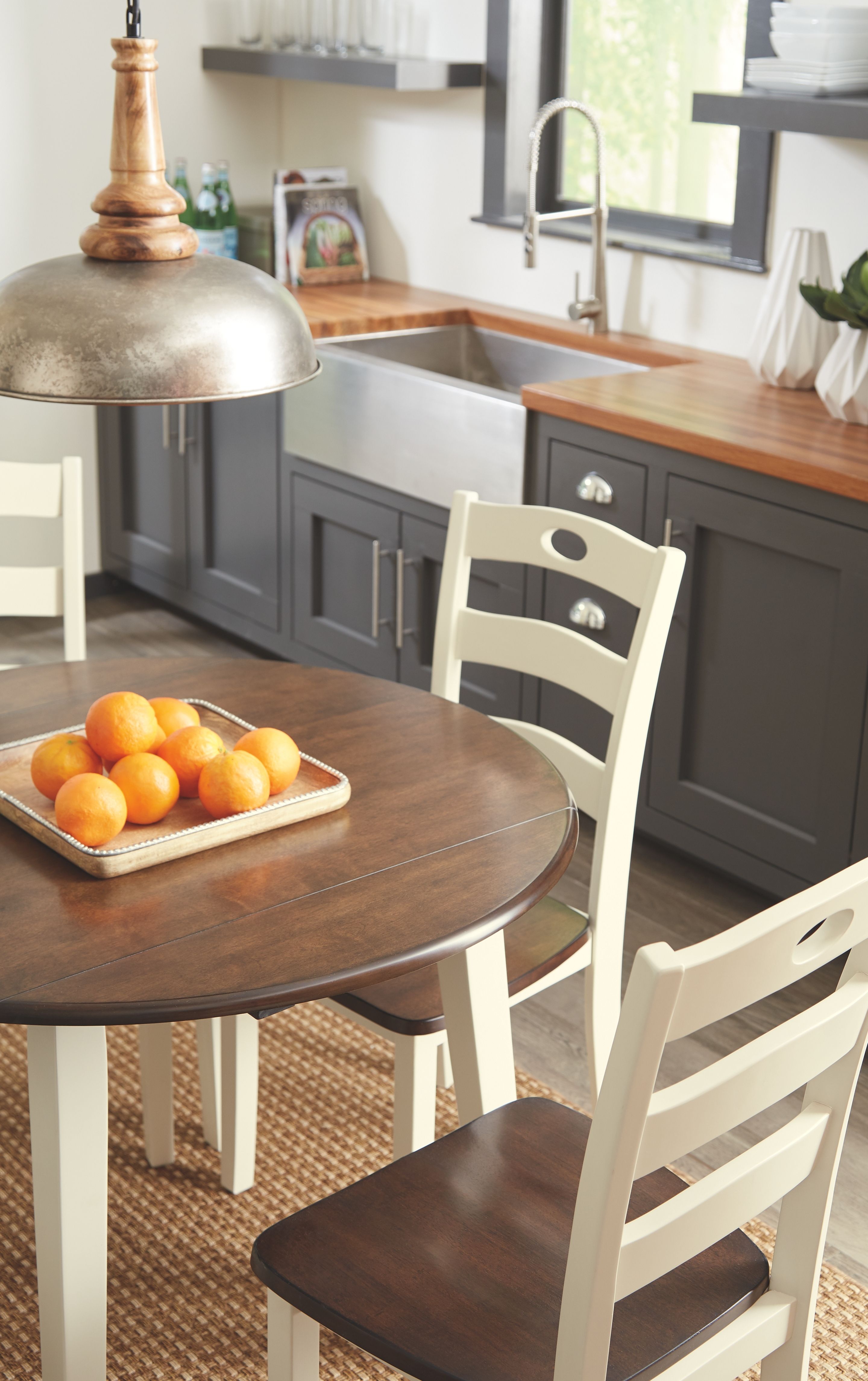 Signature Design by Ashley® Woodanville - Round Dining Table Set | Meri Furniture