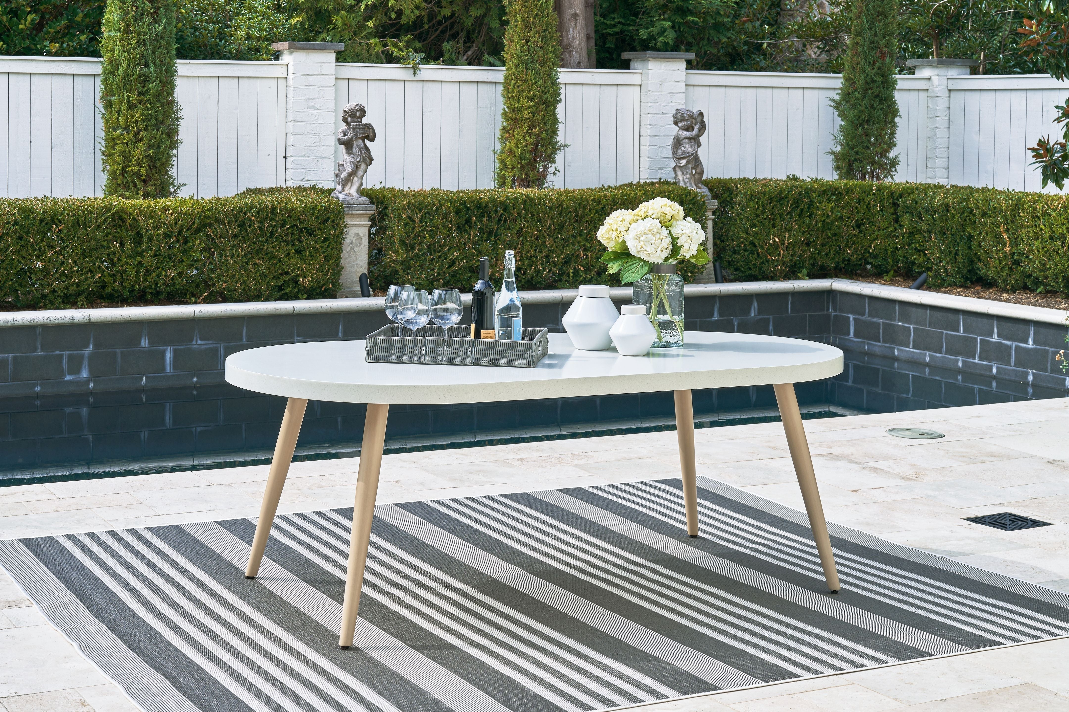 Signature Design by Ashley® Seton Creek - White - Oval Dining Table With Umb Opt | Meri Furniture