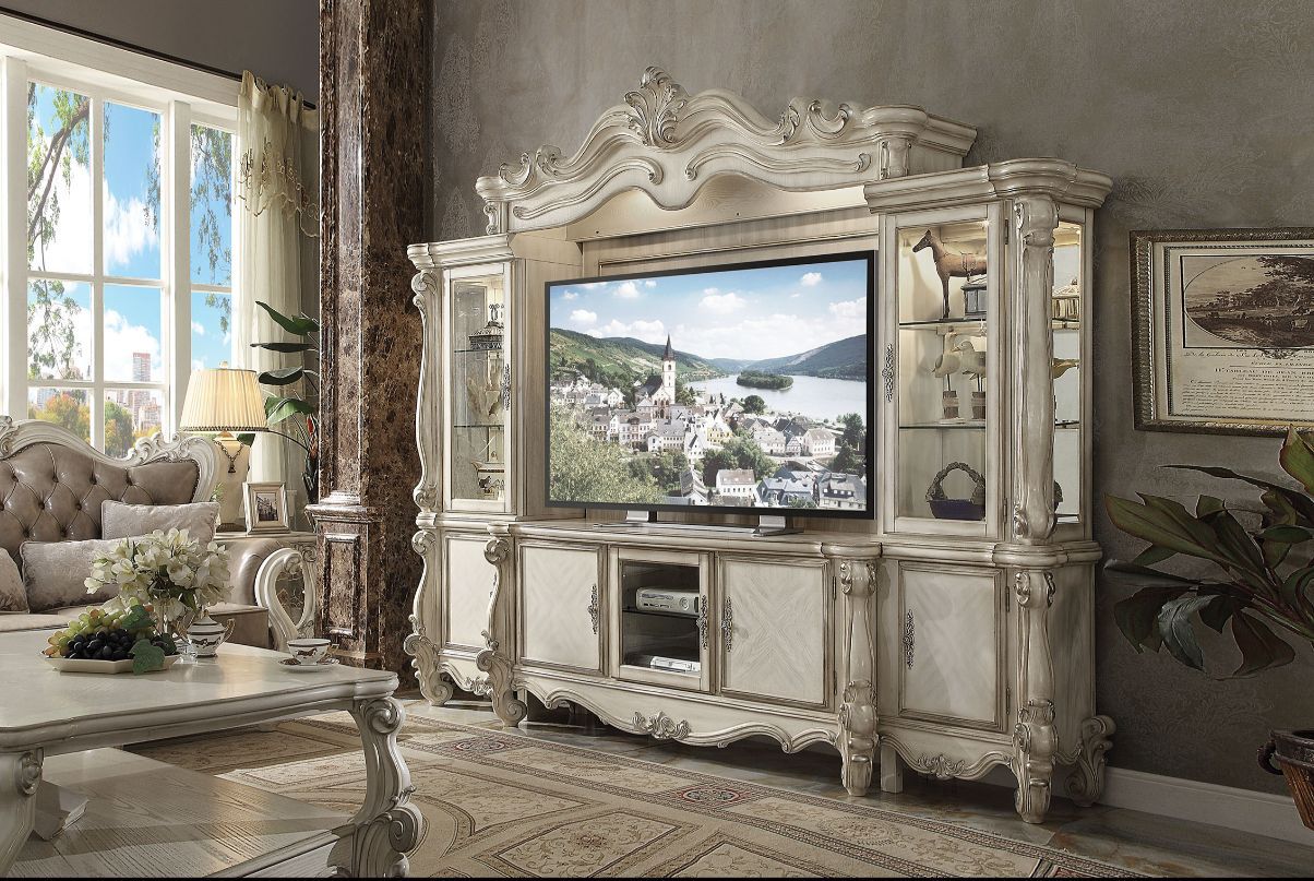 ACME The Versailles the entertainment center was inspired by old European design. This collection features carved scrollwork accent on the bridge's crown. | Meri Furniture