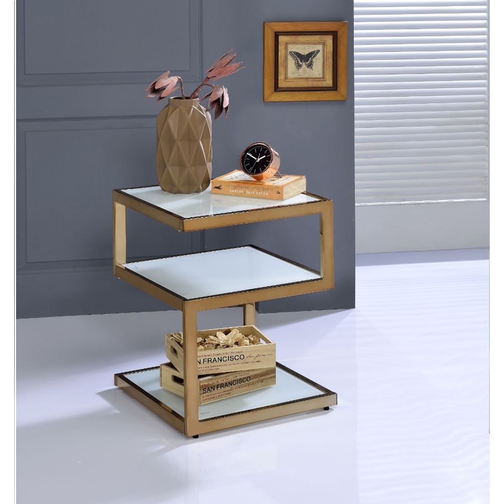 ACME The Alyea occasional table collection its a balancing act of sorts. This unique table is fun and functional, features shelves design. The mix of glass and metal make this a wonderful addition. | Meri Furniture