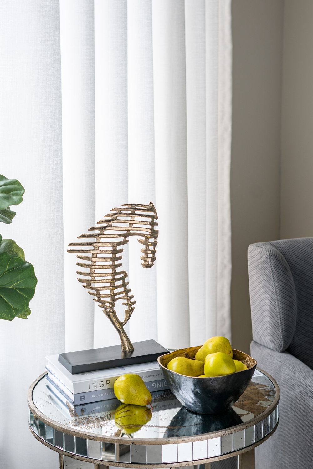 Round Table With Elegant Foral Design And Mirrored