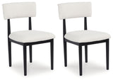 Xandrum - White / Black - 5 Pc. - Round Dining Room Table, 4 Side Chairs