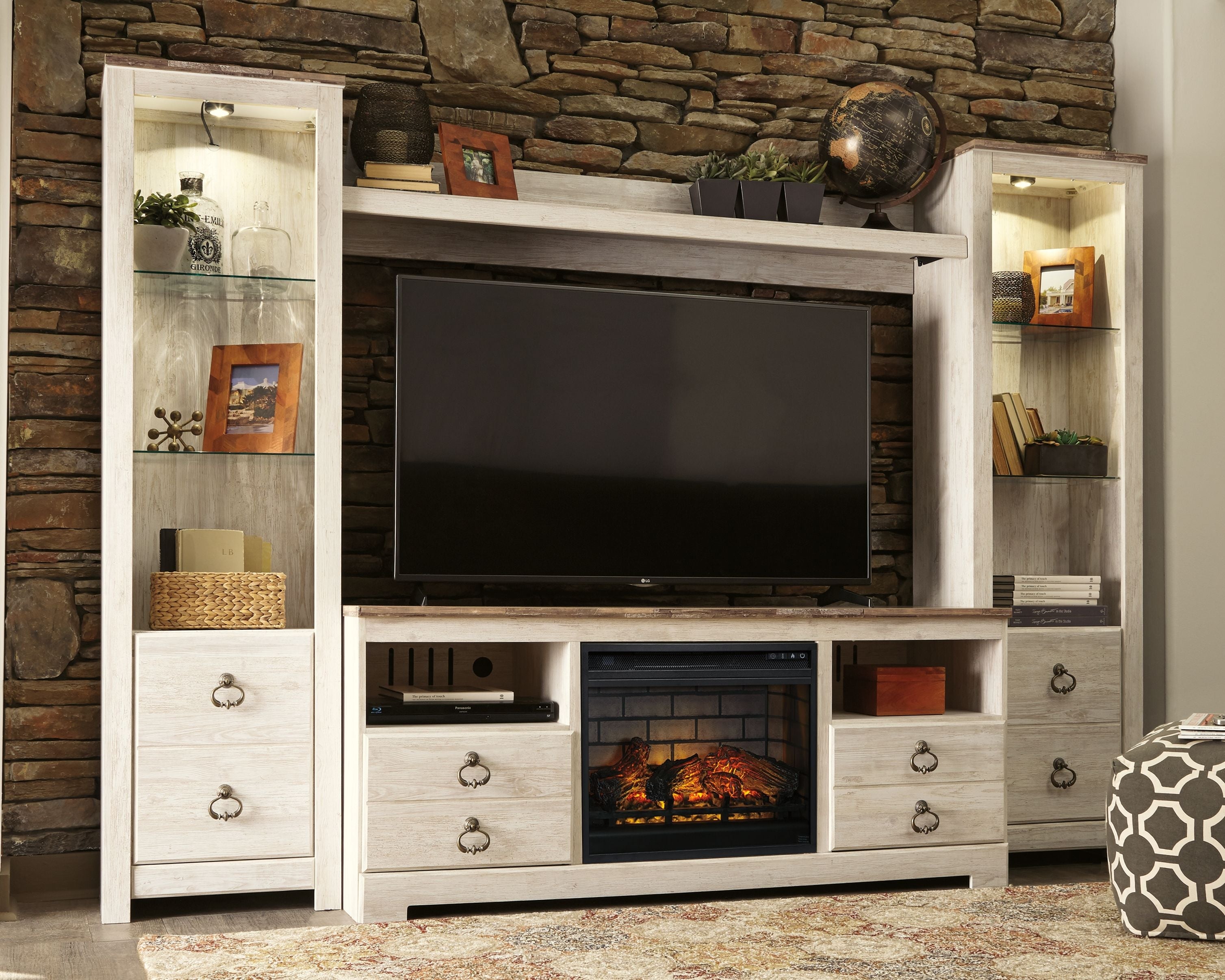 Signature Design by Ashley® Willowton - Whitewash - Entertainment Center - TV Stand With Faux Firebrick Fireplace Insert | Meri Furniture
