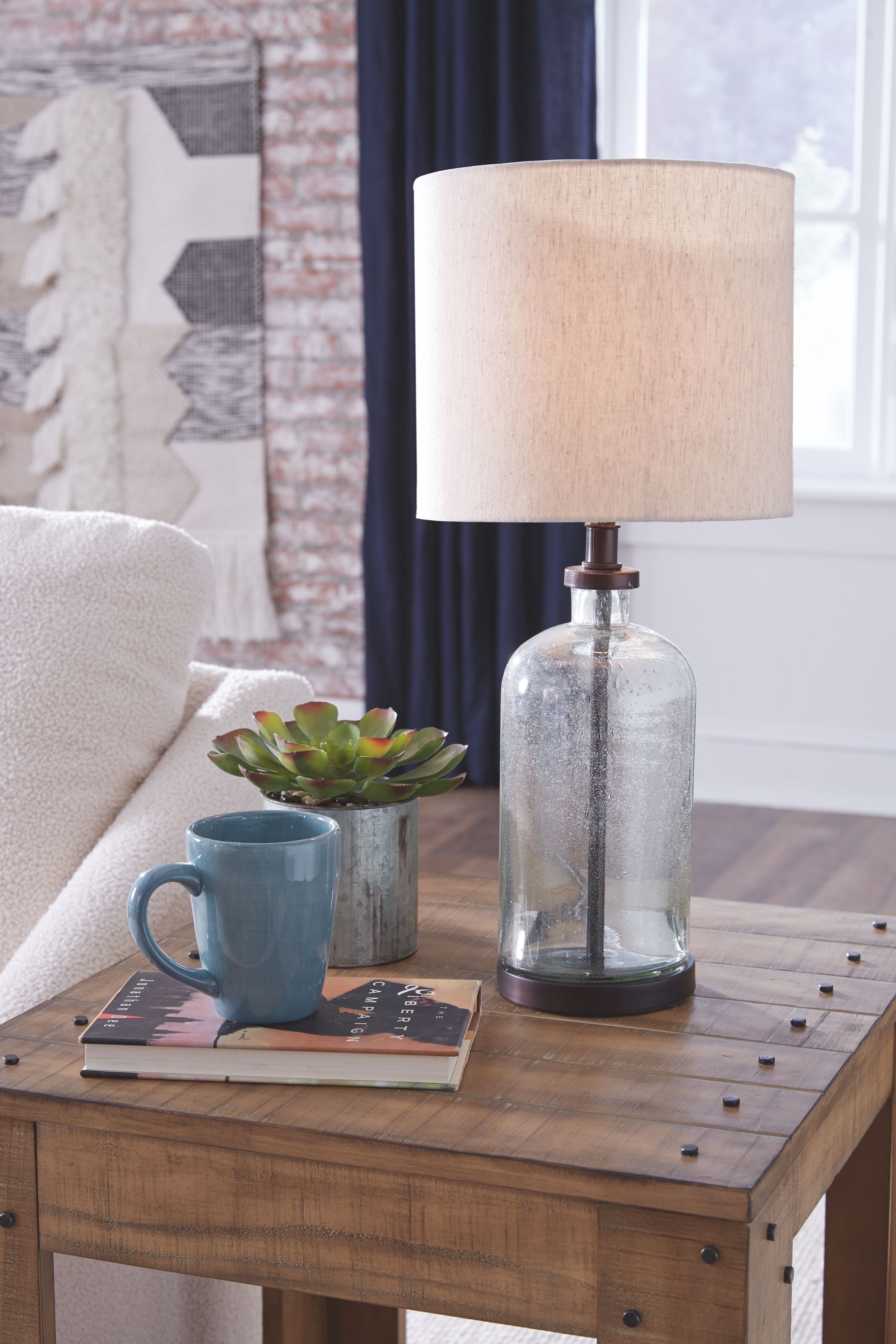 Ashley Furniture Bandile - Clear / Bronze Finish - Glass Table Lamp | Meri Furniture