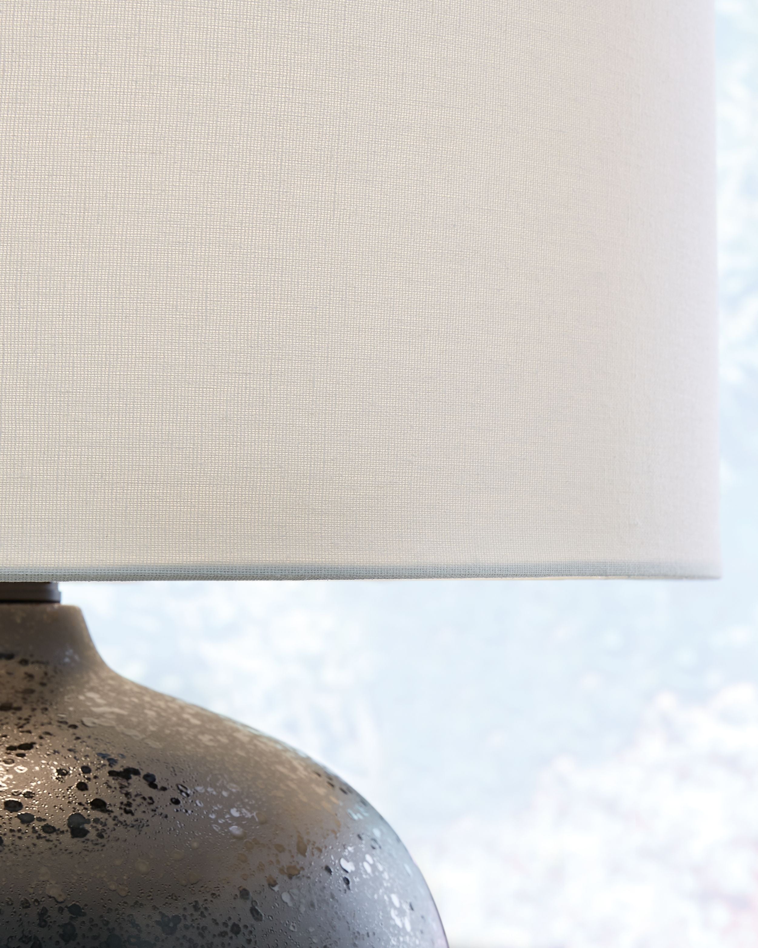 Signature Design by Ashley® Ladstow - Black - Ceramic Table Lamp | Meri Furniture
