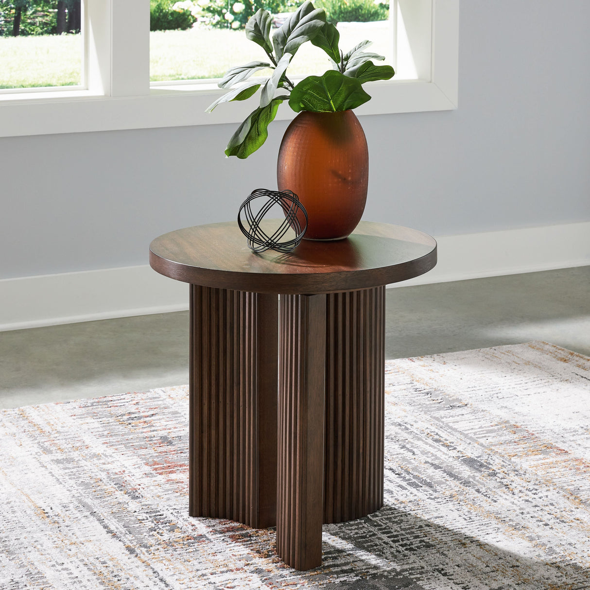 Signature Design by Ashley® Korestone - Dark Brown - Round End Table | Meri Furniture