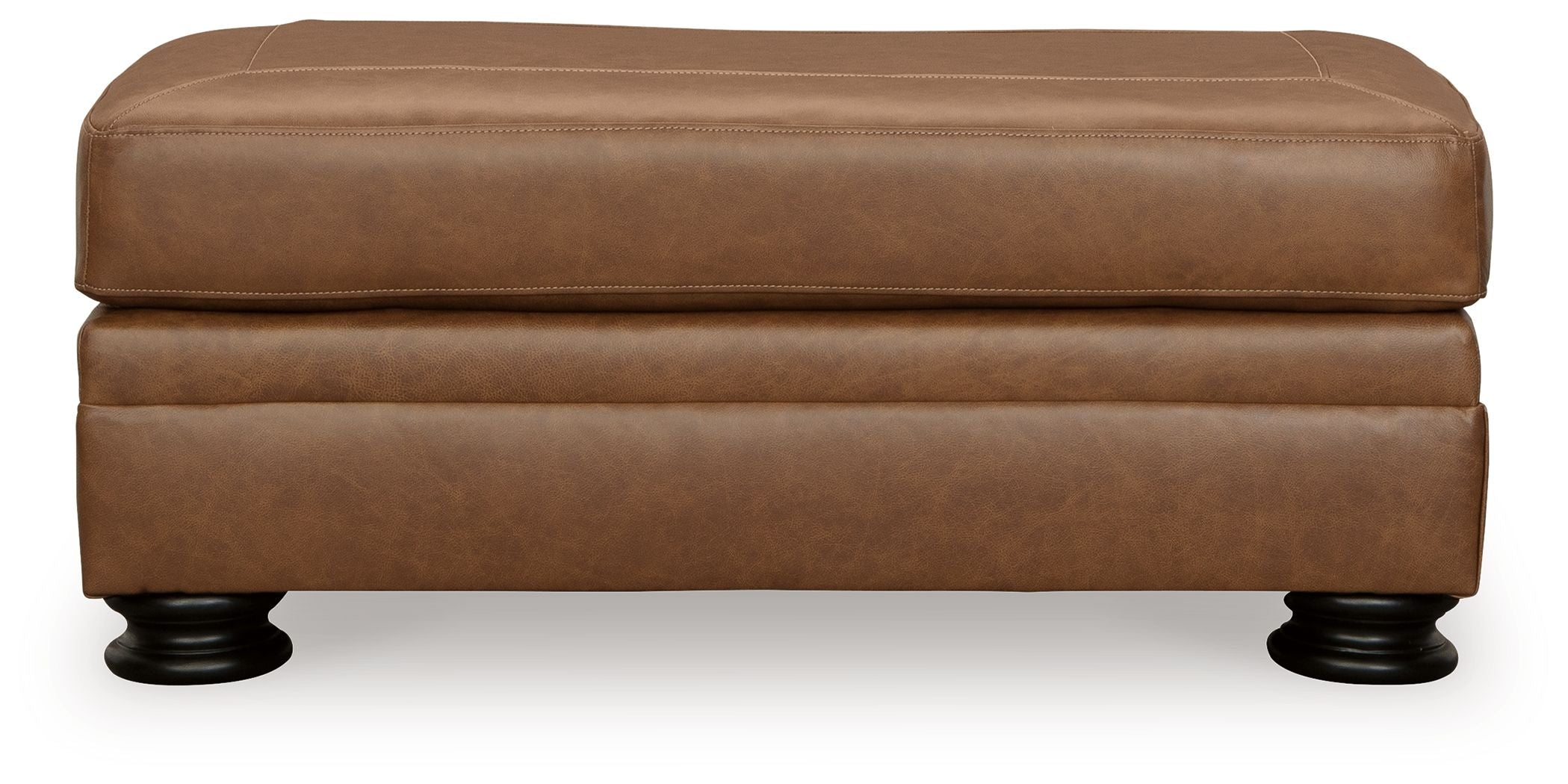 Signature Design by Ashley® Carianna - Caramel - Ottoman | Meri Furniture