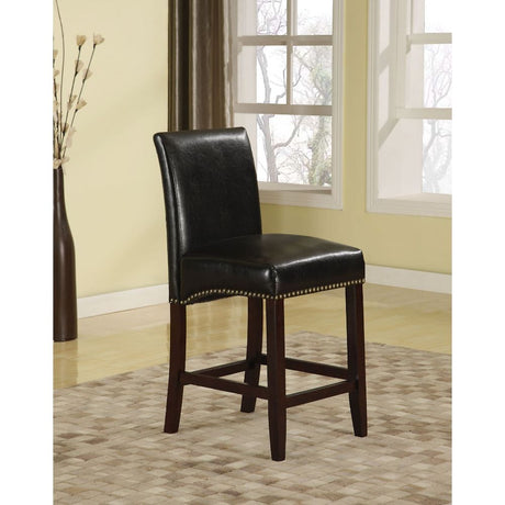 The Jakki sophisticated counter chair features crisp bycast leather and elegant nailhead trim details. The bycast leather seat and back with nailhead bottom accent trim will stand out as bold and stylish. Available in white and black.