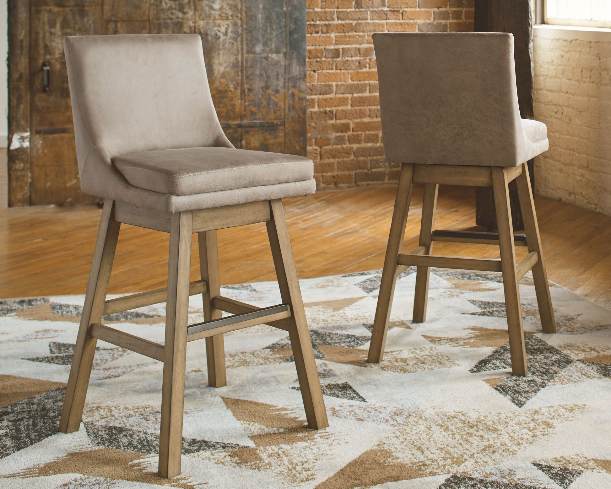 Signature Design by Ashley® Tallenger - Swivel Barstool (Set of 2) | Meri Furniture