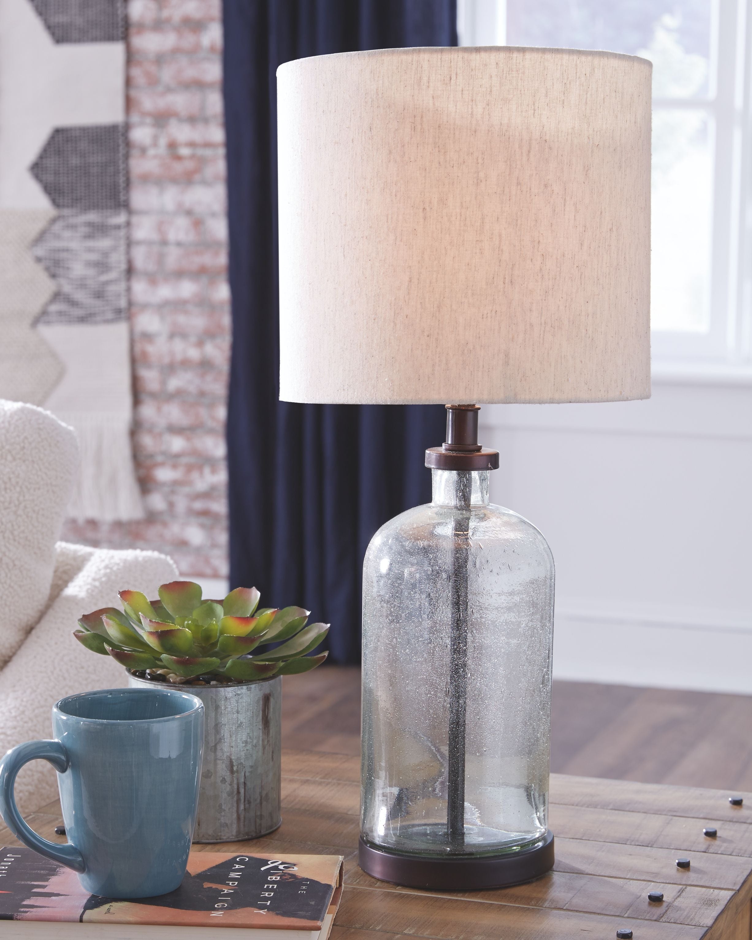Ashley Furniture Bandile - Clear / Bronze Finish - Glass Table Lamp | Meri Furniture