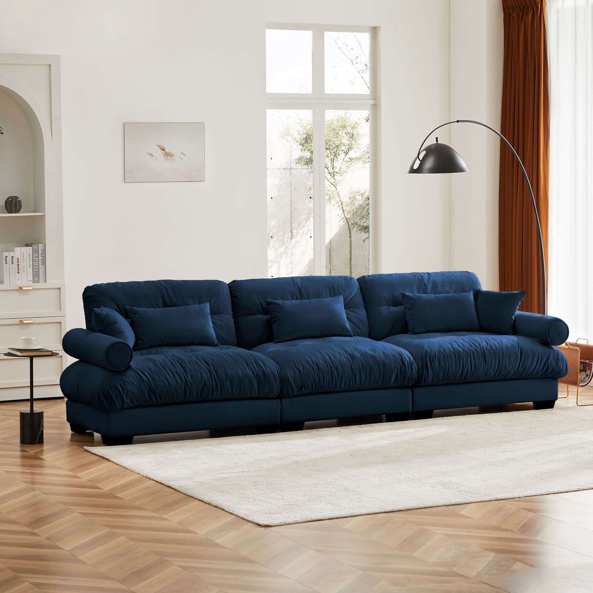 Modern Velvet Sofa With Bolstered Armrests And Pillows
