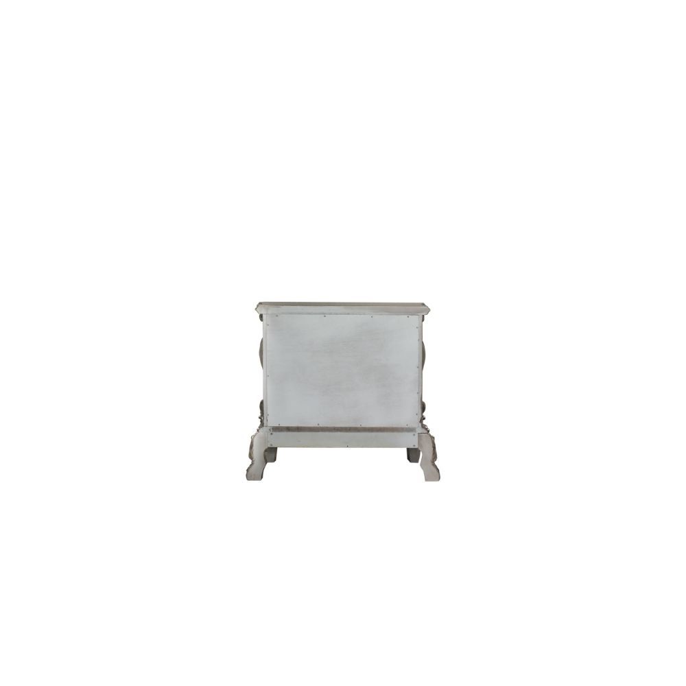 ACME The Dresden Nightstand offers beautiful craftsmanship and artistic carvings. It features solid hardwood with two drawers for storage with coordinating carvings. The drawers feature dove tail construction and are decorated with antique brass hardware.