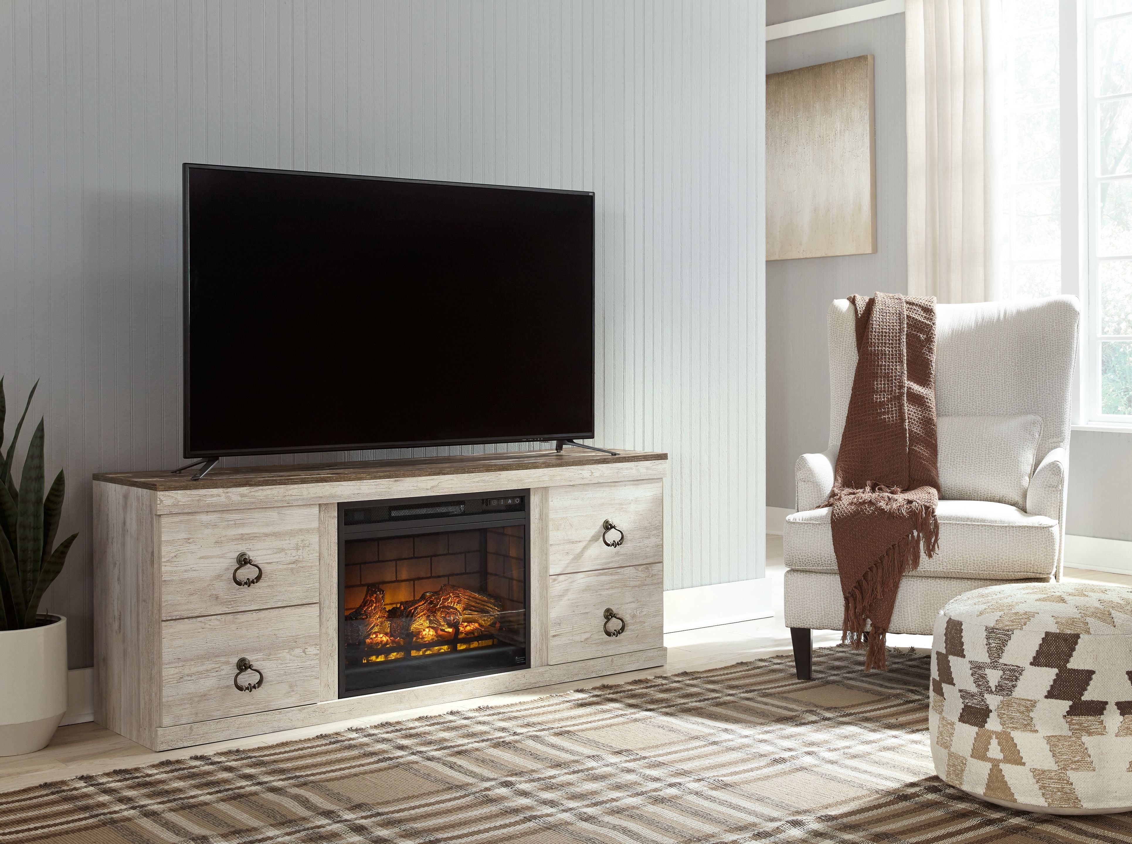 Signature Design by Ashley® Willowton - Whitewash - TV Stand With Electric Fireplace | Meri Furniture