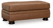 Signature Design by Ashley® Carianna - Caramel - Ottoman | Meri Furniture