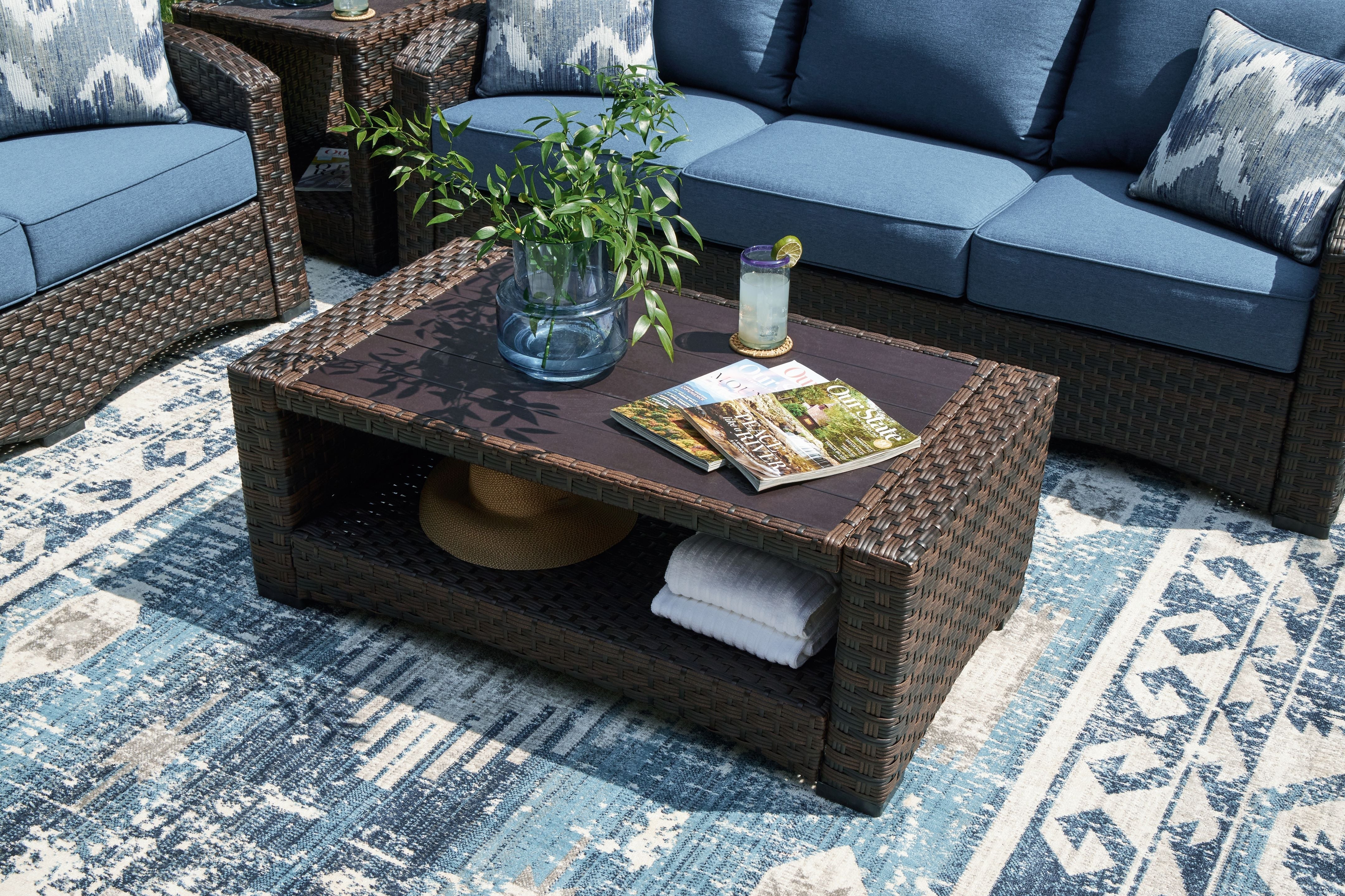 Signature Design by Ashley® Windglow - Brown - Rectangular Cocktail Table | Meri Furniture