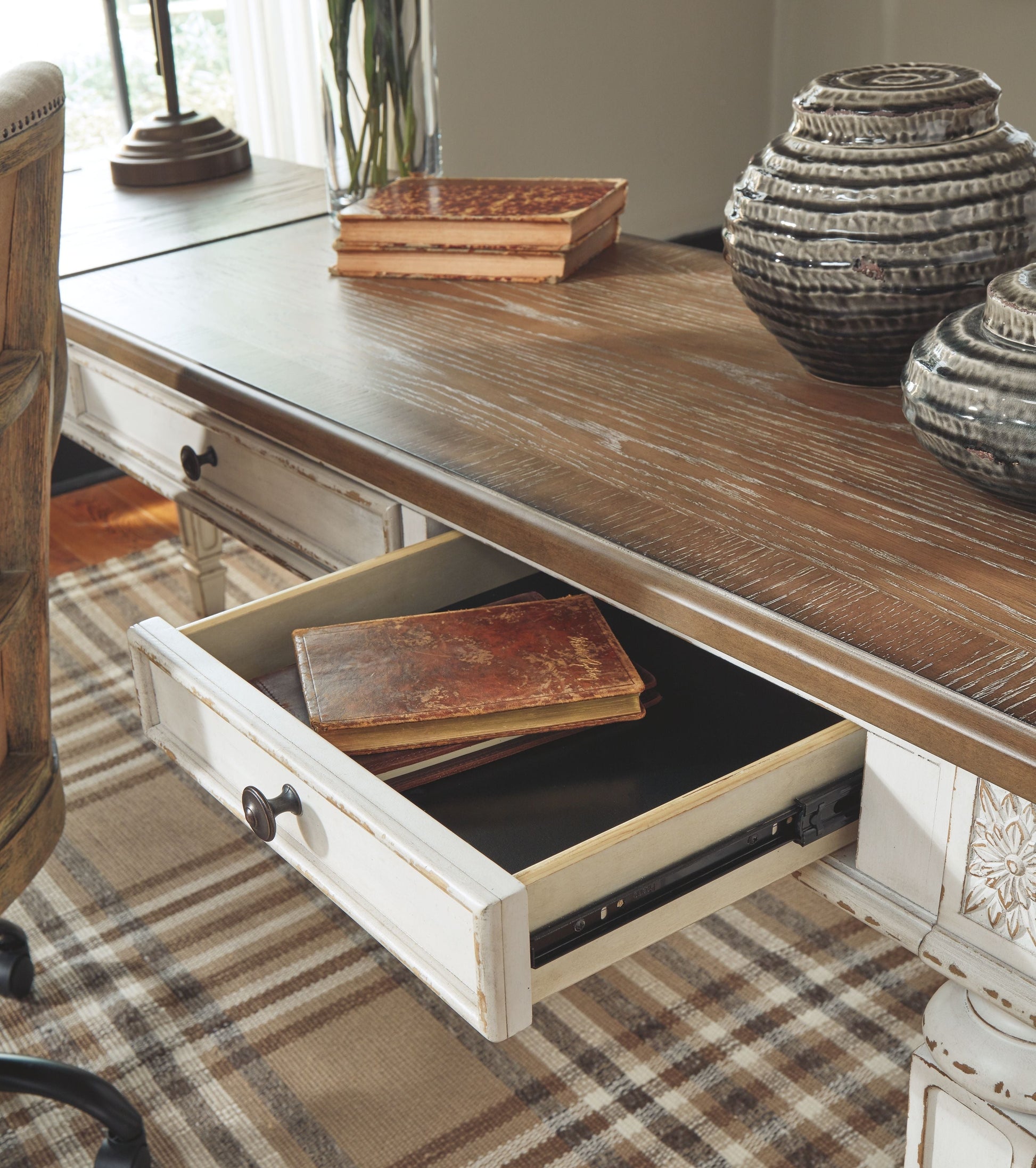 Signature Design by Ashley® Realyn - White / Brown - L Shaped Desk With Lift Top | Meri Furniture