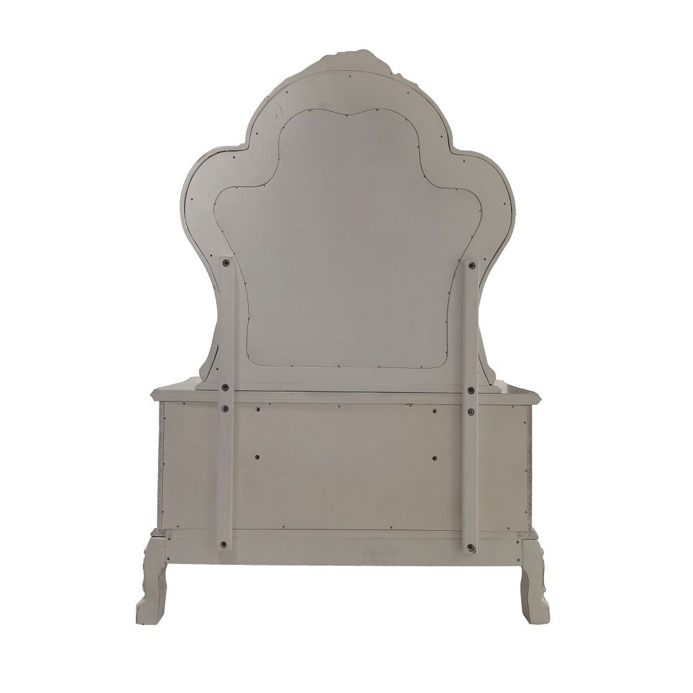 ACME Create an elegant, classy design in your bedroom with the Dresden gold patina and bone mirror. This mirror features a beautiful scrolled frame with beveled edges. Add this mirror to any other piece from this collection to create the perfect bedroom.