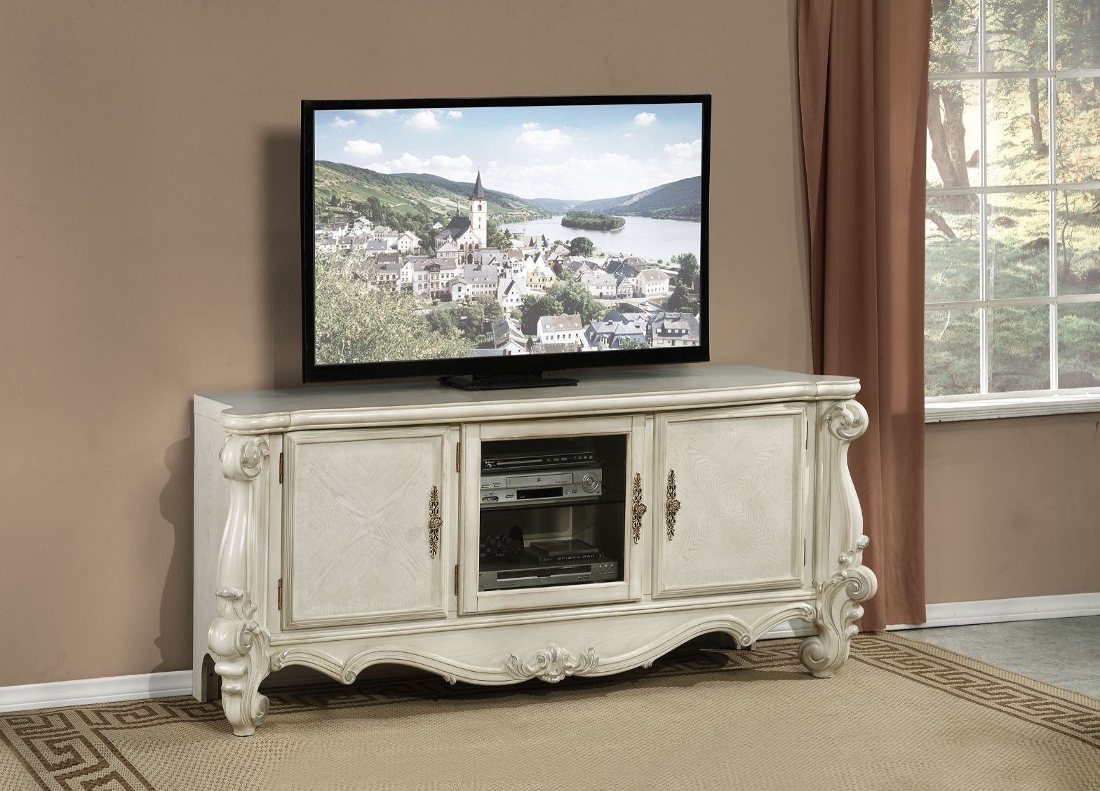 ACME The Versailles the TV Stand was inspired by old European design. This collection features carved scrollwork accent on legs and trim base. | Meri Furniture
