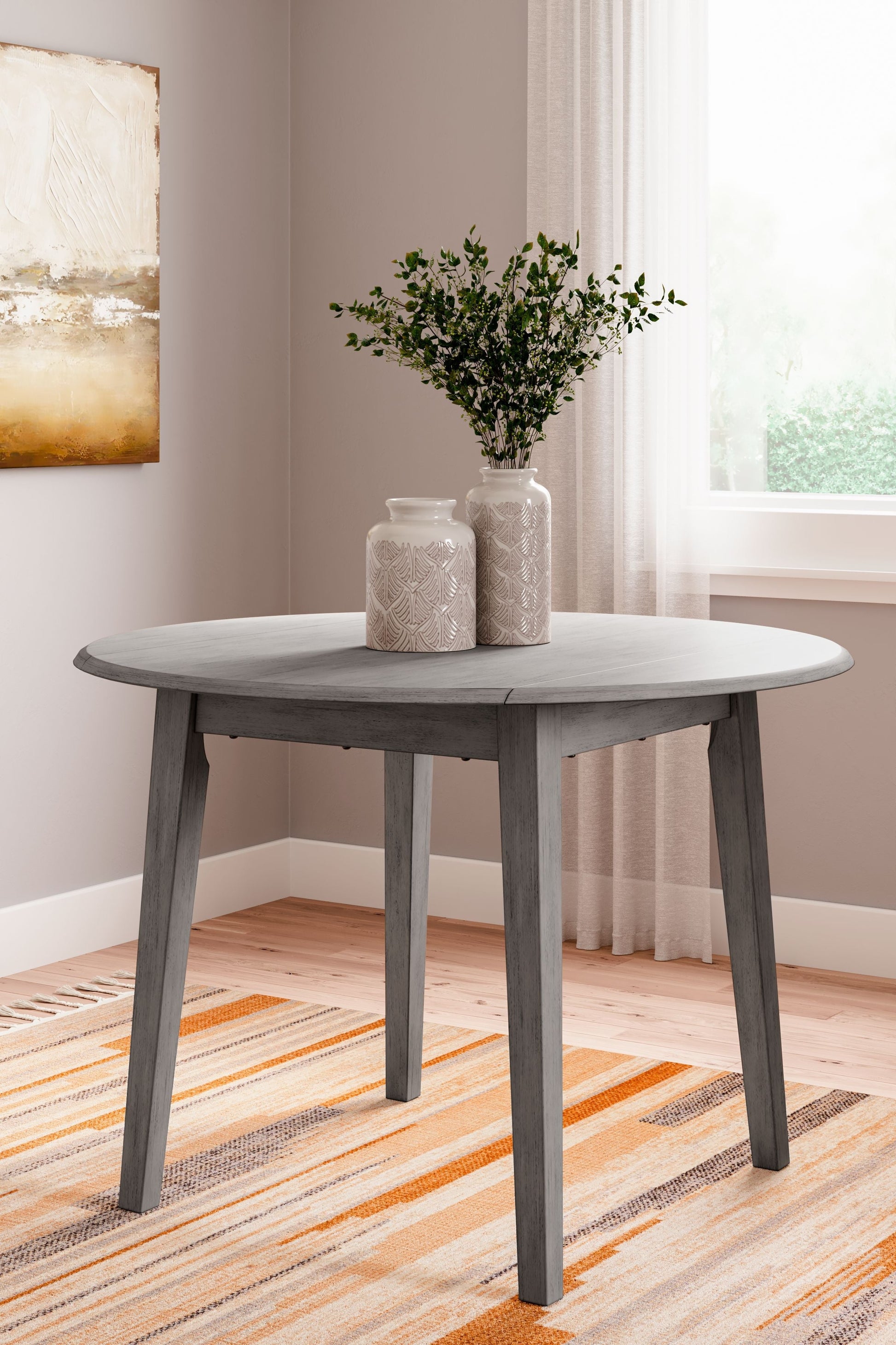 Signature Design by Ashley® Shullden - Gray - Round Drm Drop Leaf Table | Meri Furniture