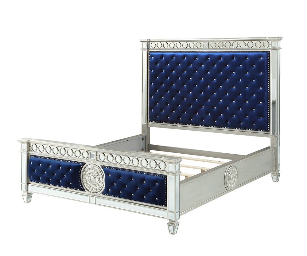 ACME The Varian bed provides a commanding presence in any room. This contemporary panel bed features a padded rectangular headboard and low profile footboard in luxurious upholstery with elegantly tapered legs. | Meri Furniture
