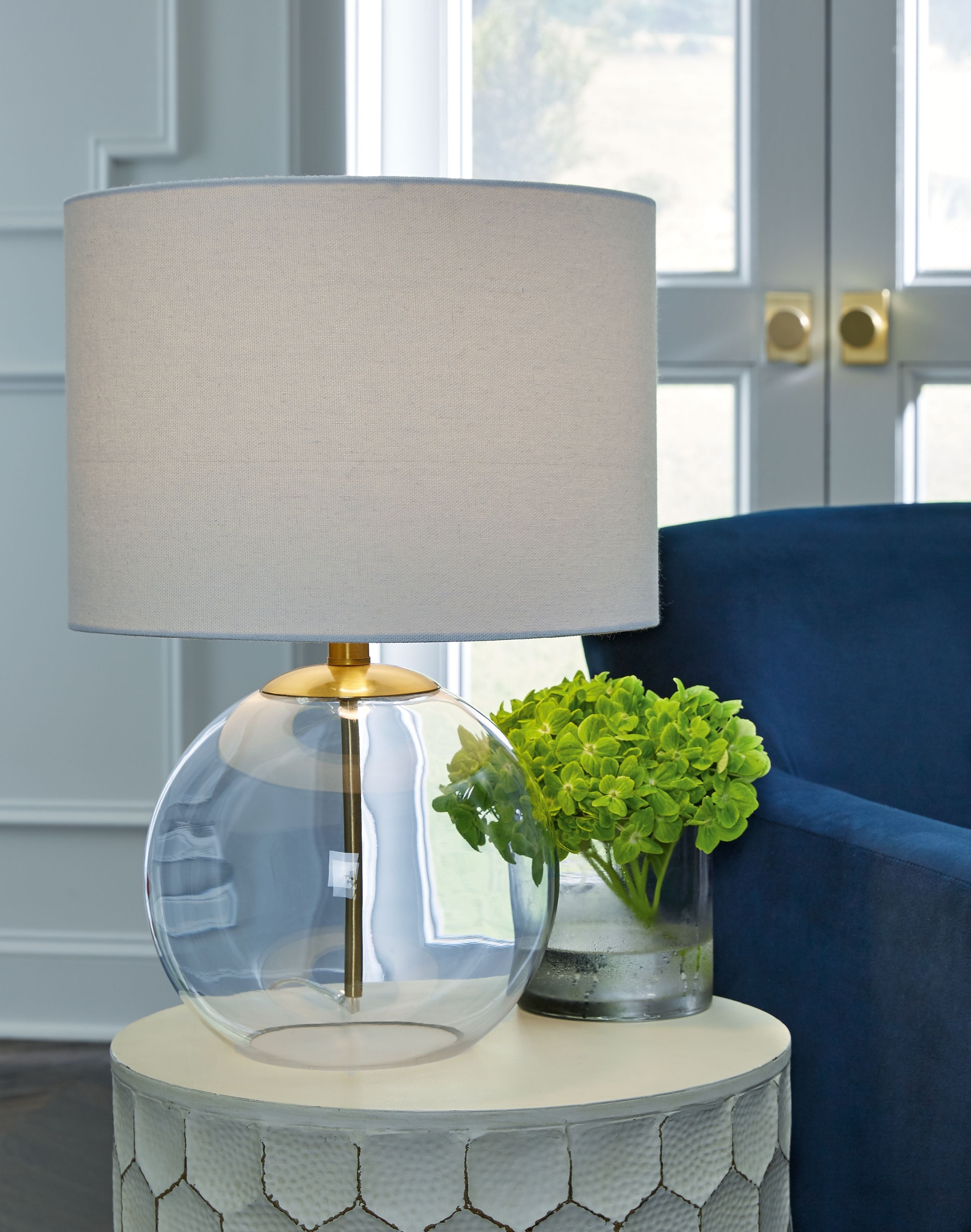 Signature Design by Ashley® Samder - White - Glass Table Lamp | Meri Furniture
