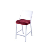 The Nadie II counter height side chairs feature comfortable button tufted seats, with clear Acrylic Bucket Style mid high backrest and tapered legs in a velvet finish.