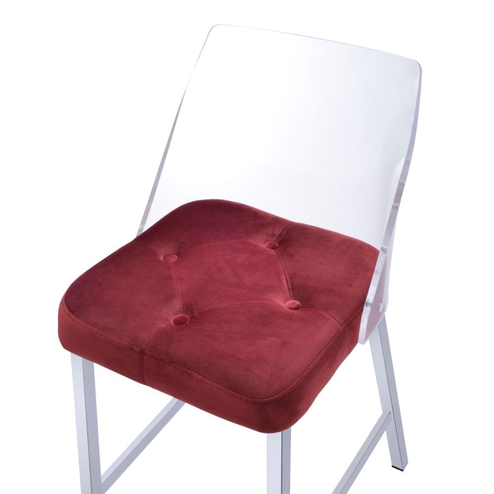 The Nadie II counter height side chairs feature comfortable button tufted seats, with clear Acrylic Bucket Style mid high backrest and tapered legs in a velvet finish.