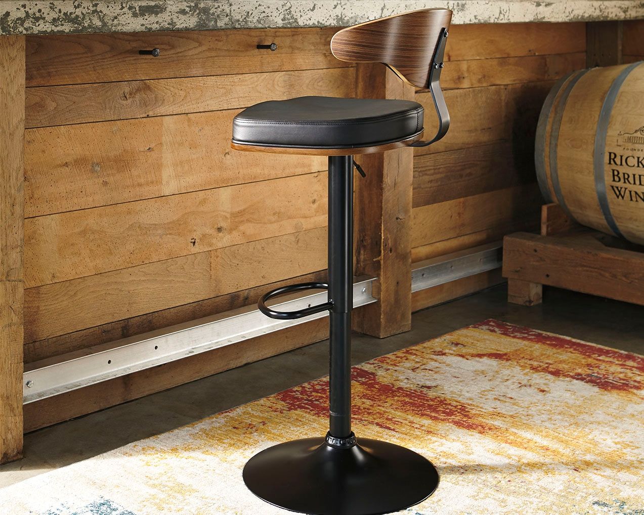 Signature Design by Ashley® Bellatier - Brown / Black - Tall Uph Swivel Barstool | Meri Furniture