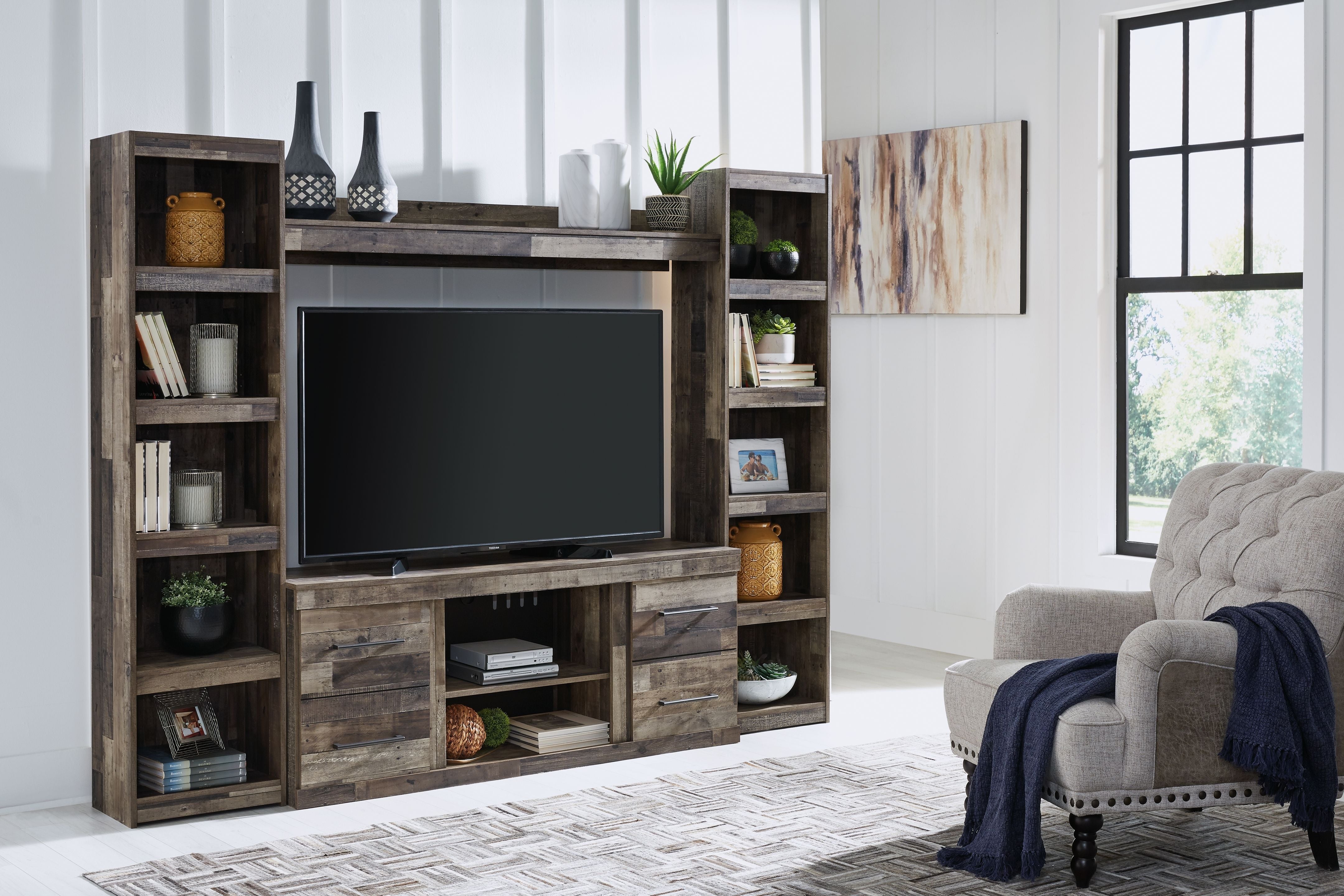 Signature Design by Ashley® Derekson - Entertainment Center | Meri Furniture
