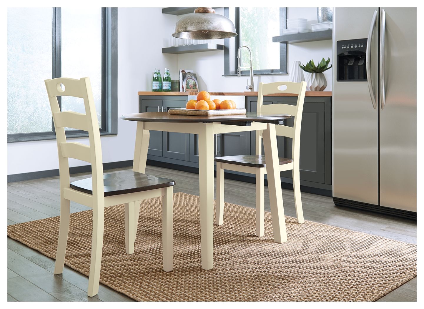 Signature Design by Ashley® Woodanville - Cream / Brown - Round Drm Drop Leaf Table | Meri Furniture