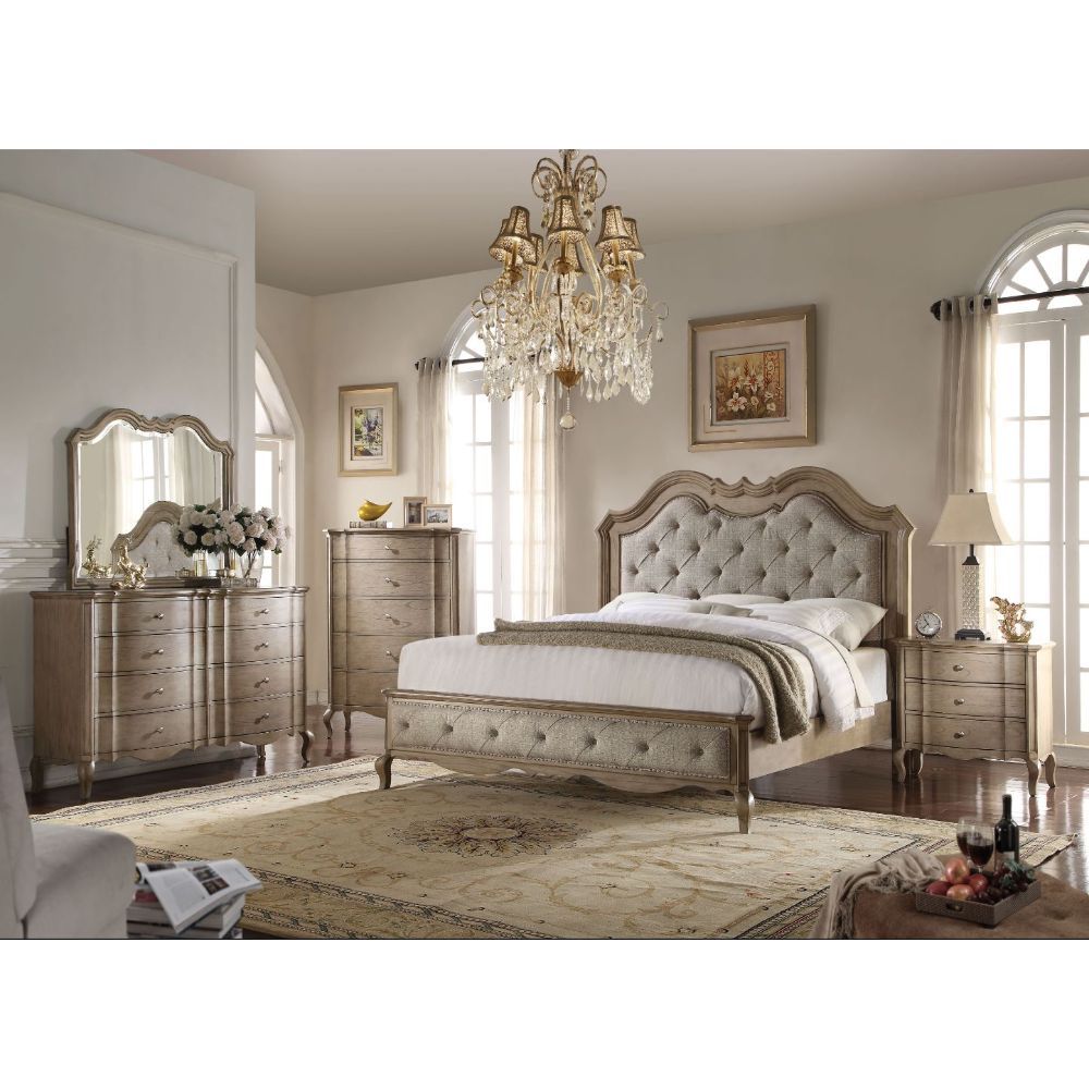 ACME Sleep in comfortable style in this Chelmsford bed constructed with durable solid wood for your long-lasting enjoyment. For a touch of elegance, this upholstered bedroom collection features cursive components for a classy appearance. | Meri Furniture
