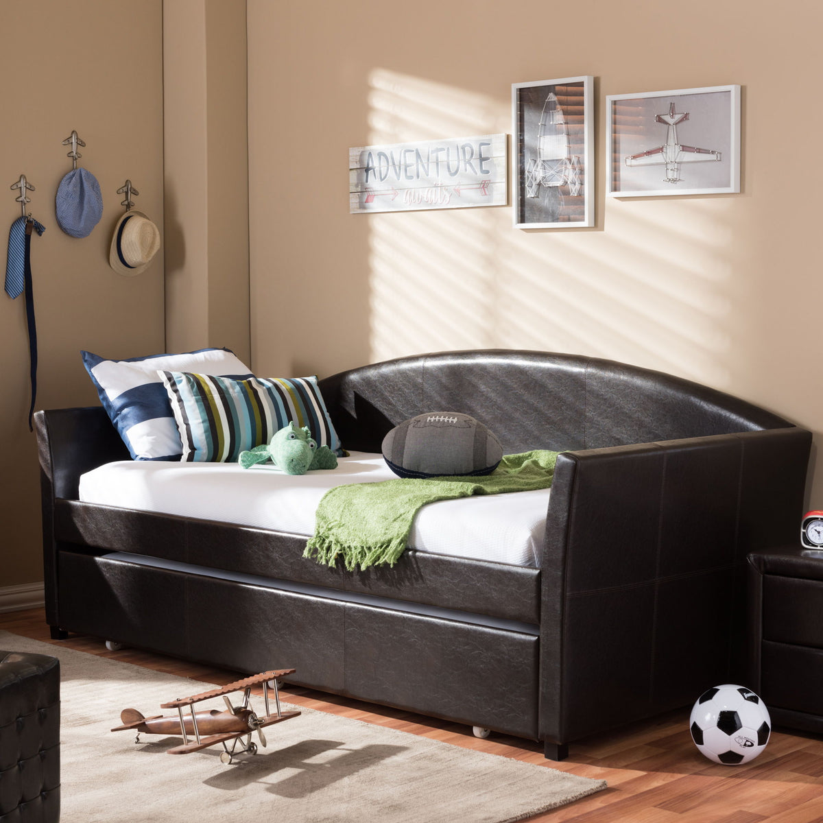 London Modern and Contemporary Brown Faux Leather Arched Back Sofa Twin Daybed with Roll-Out Trundle Guest Bed