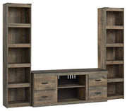 Signature Design by Ashley® Trinell - Brown - 3-Piece Entertainment Center | Meri Furniture