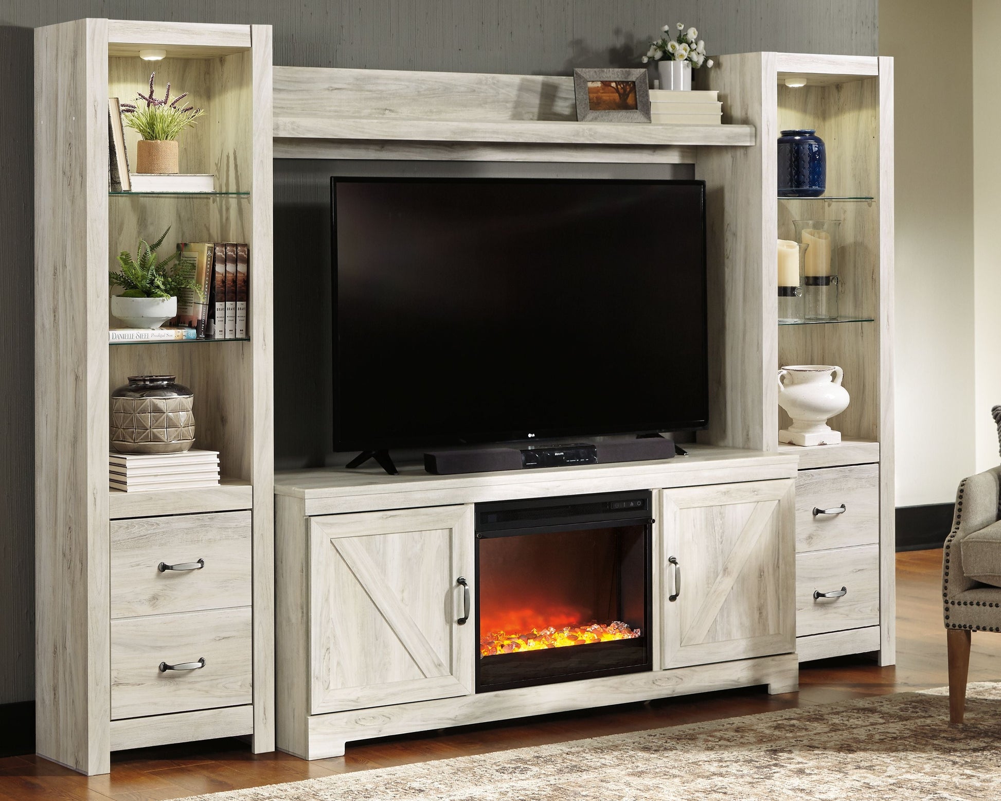 Signature Design by Ashley® Bellaby - Entertainment Center | Meri Furniture
