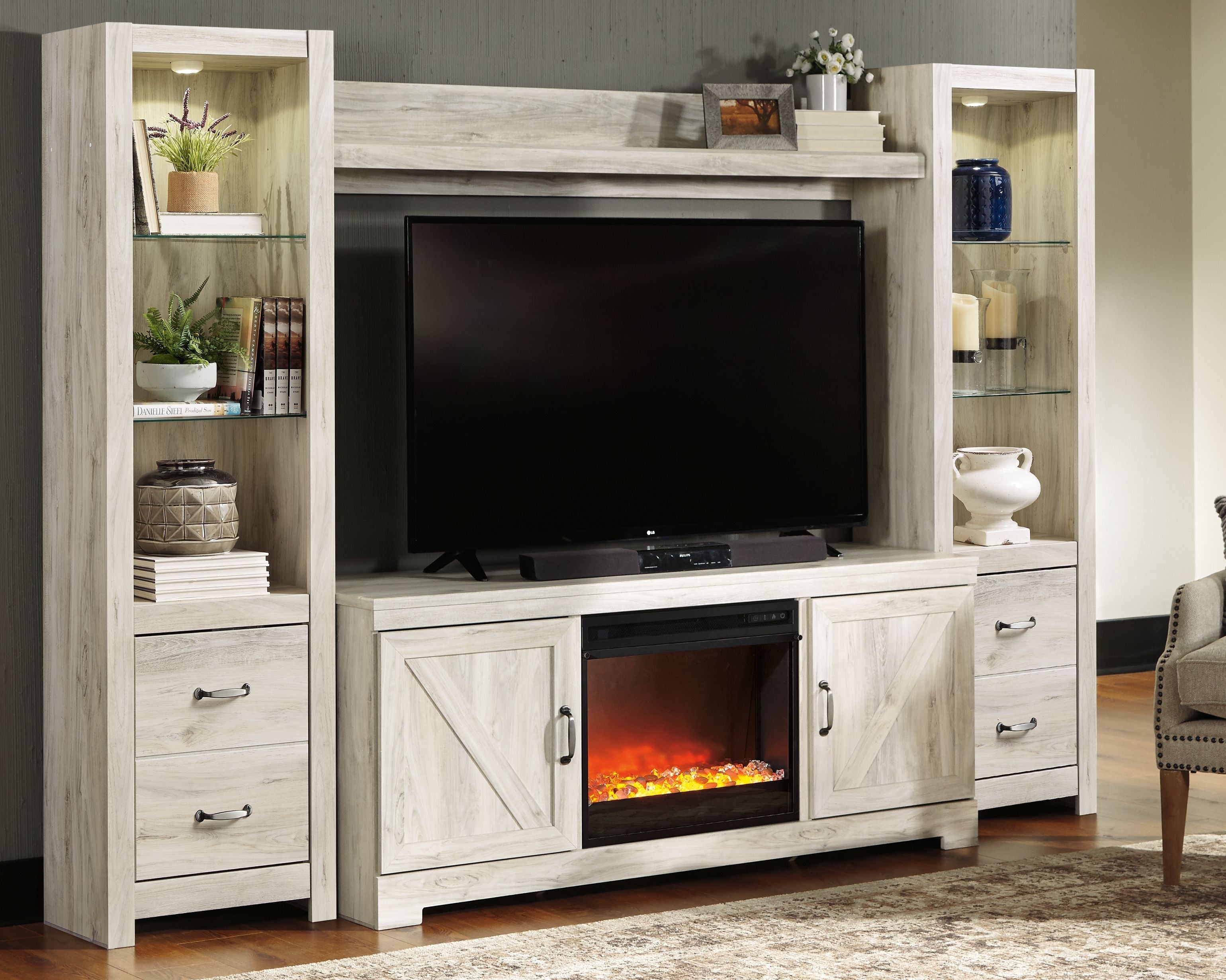 Signature Design by Ashley® Bellaby - Entertainment Center | Meri Furniture