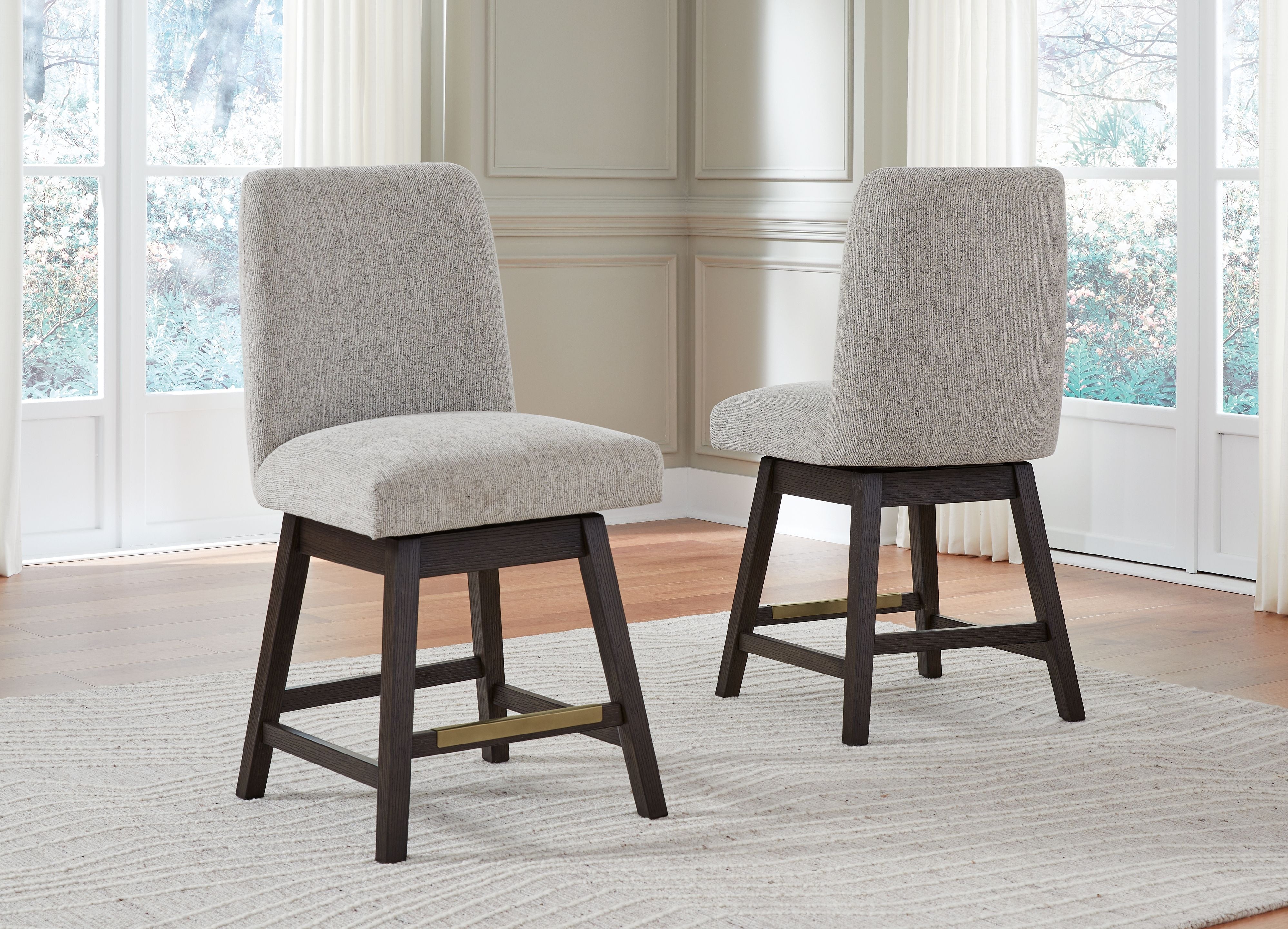 Signature Design by Ashley® Burkhaus - Beige / Dark Brown - Upholstered Swivel Barstool (Set of 2) | Meri Furniture