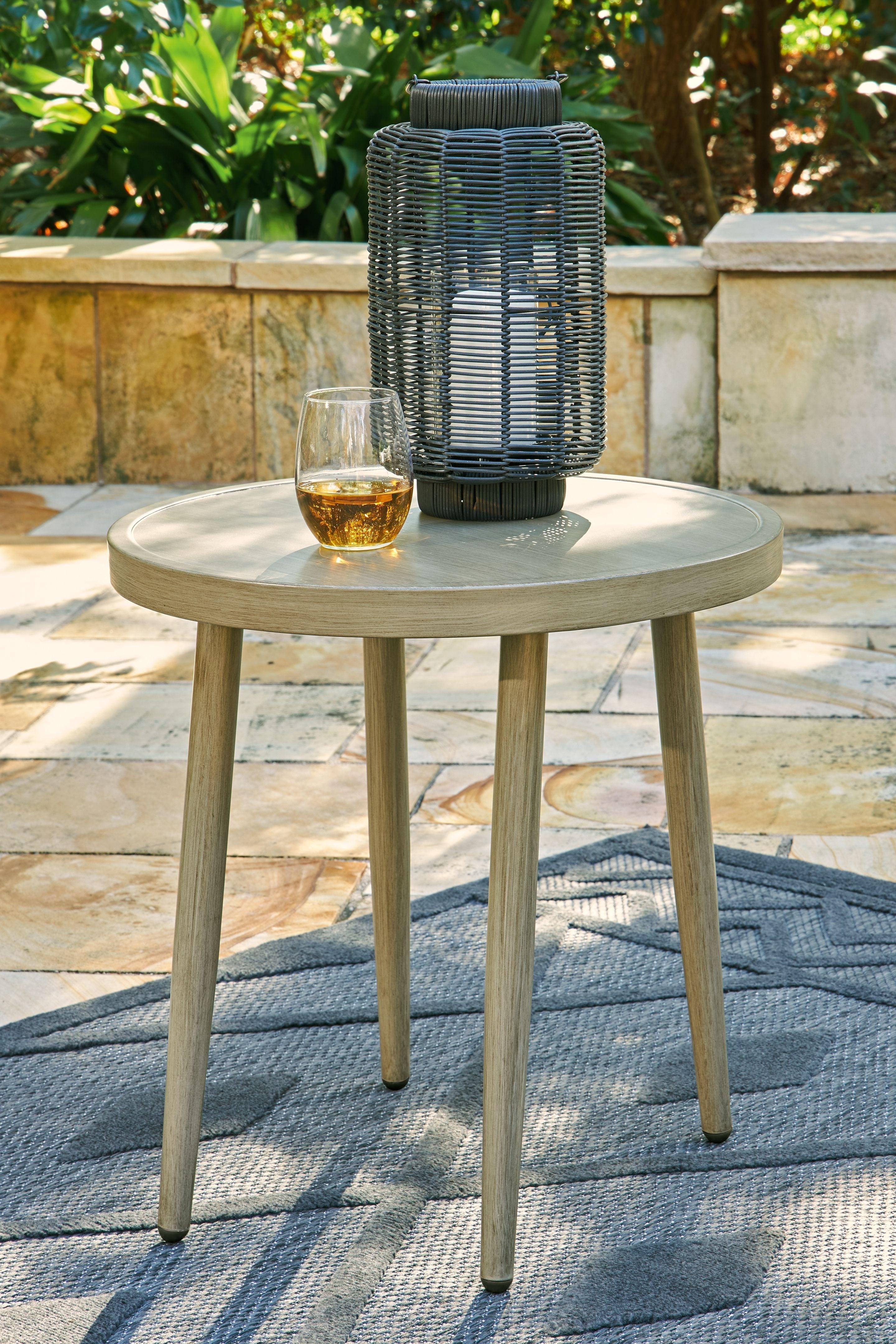 Signature Design by Ashley® Swiss Valley - Beige - Round End Table | Meri Furniture