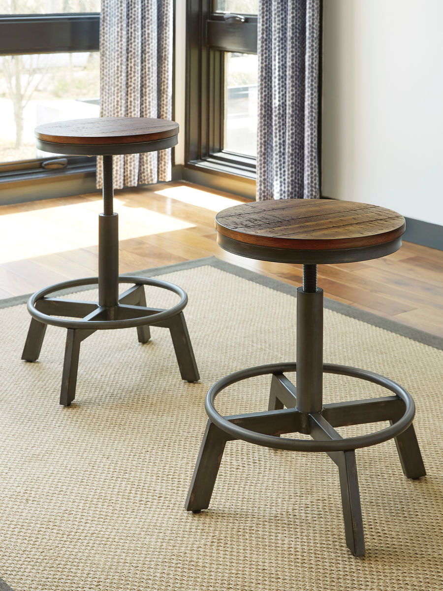 Signature Design by Ashley® Torjin - Dark Brown - 3 Pc. - Long Counter Table, 2 Stools | Meri Furniture
