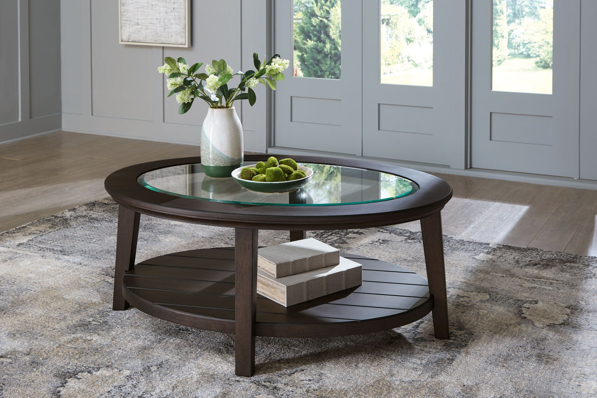 Signature Design by Ashley® Celamar - Dark Brown - Oval Cocktail Table | Meri Furniture