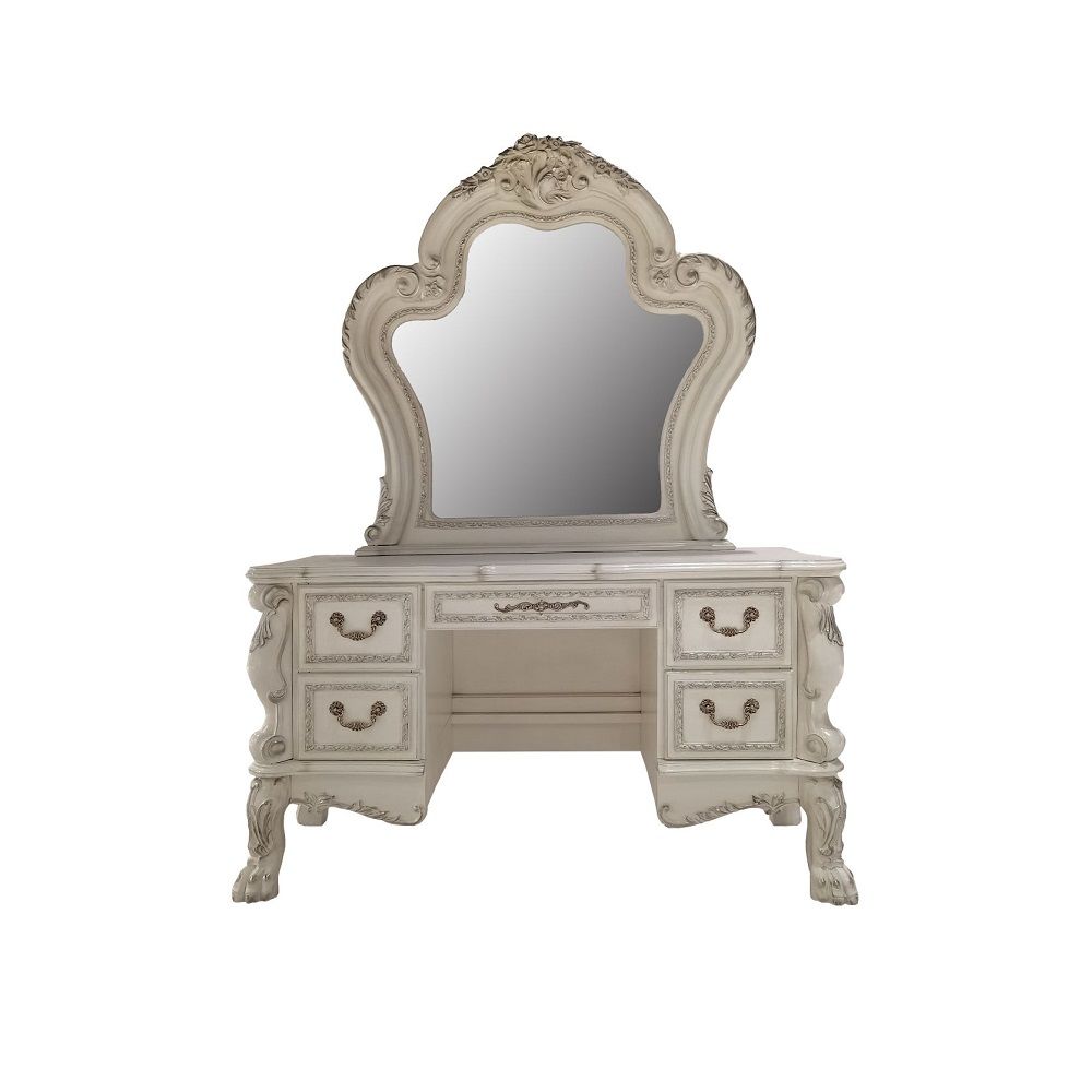 Create an elegant, classy design in your bedroom with the Dresden gold patina and bone mirror. This mirror features a beautiful scrolled frame with beveled edges. Add this mirror to any other piece from this collection to create the perfect bedroom.