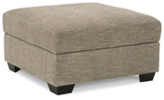 Signature Design by Ashley® Creswell - Stone - Ottoman With Storage | Meri Furniture
