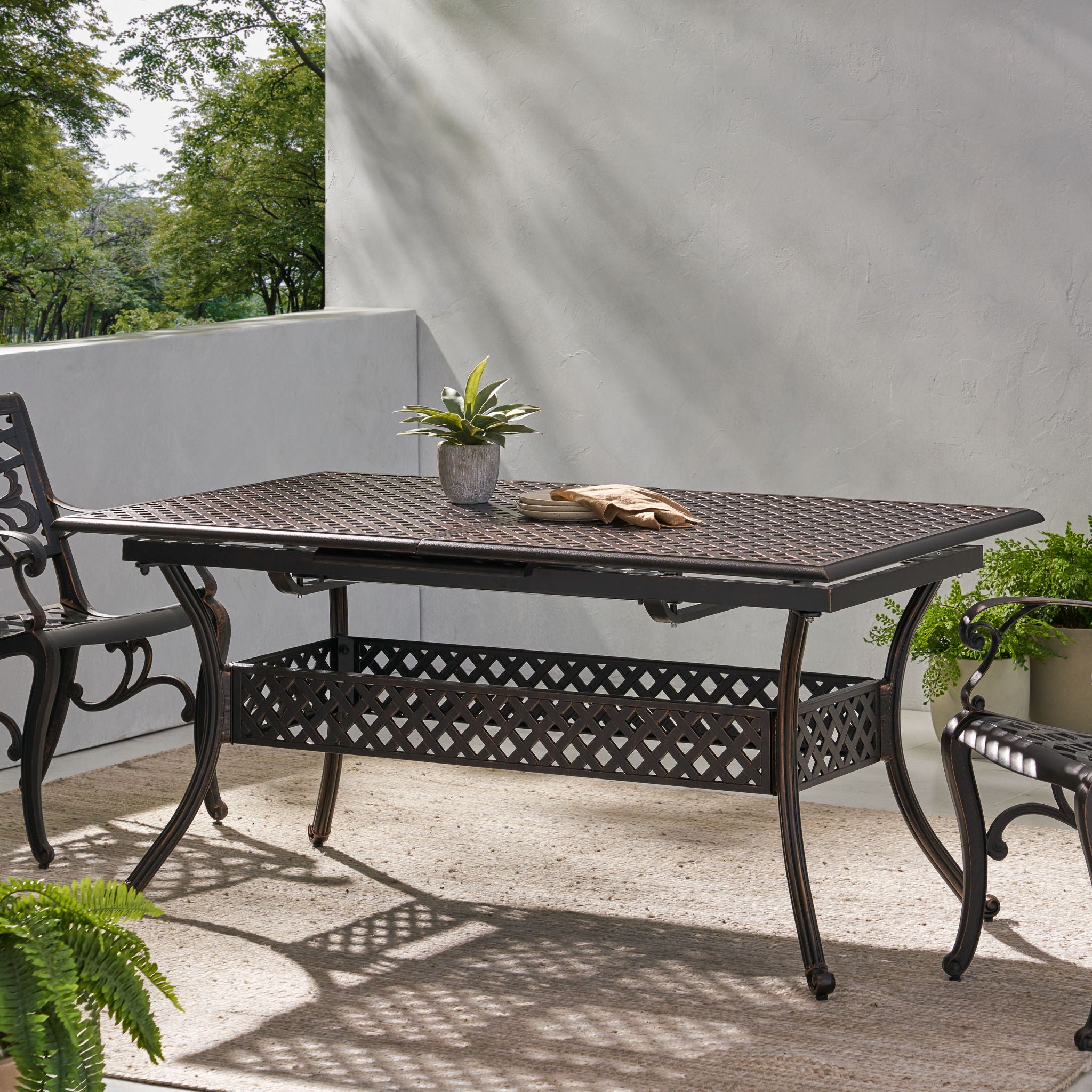 Outdoor Expandable Dining Table With Umbrella Holder, Lattice Pattern And Curved Legs - Black