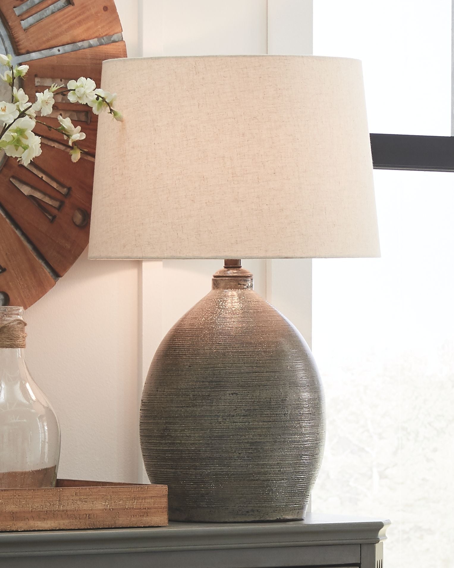 Ashley Furniture Joyelle - Gray - Terracotta Table Lamp | Meri Furniture